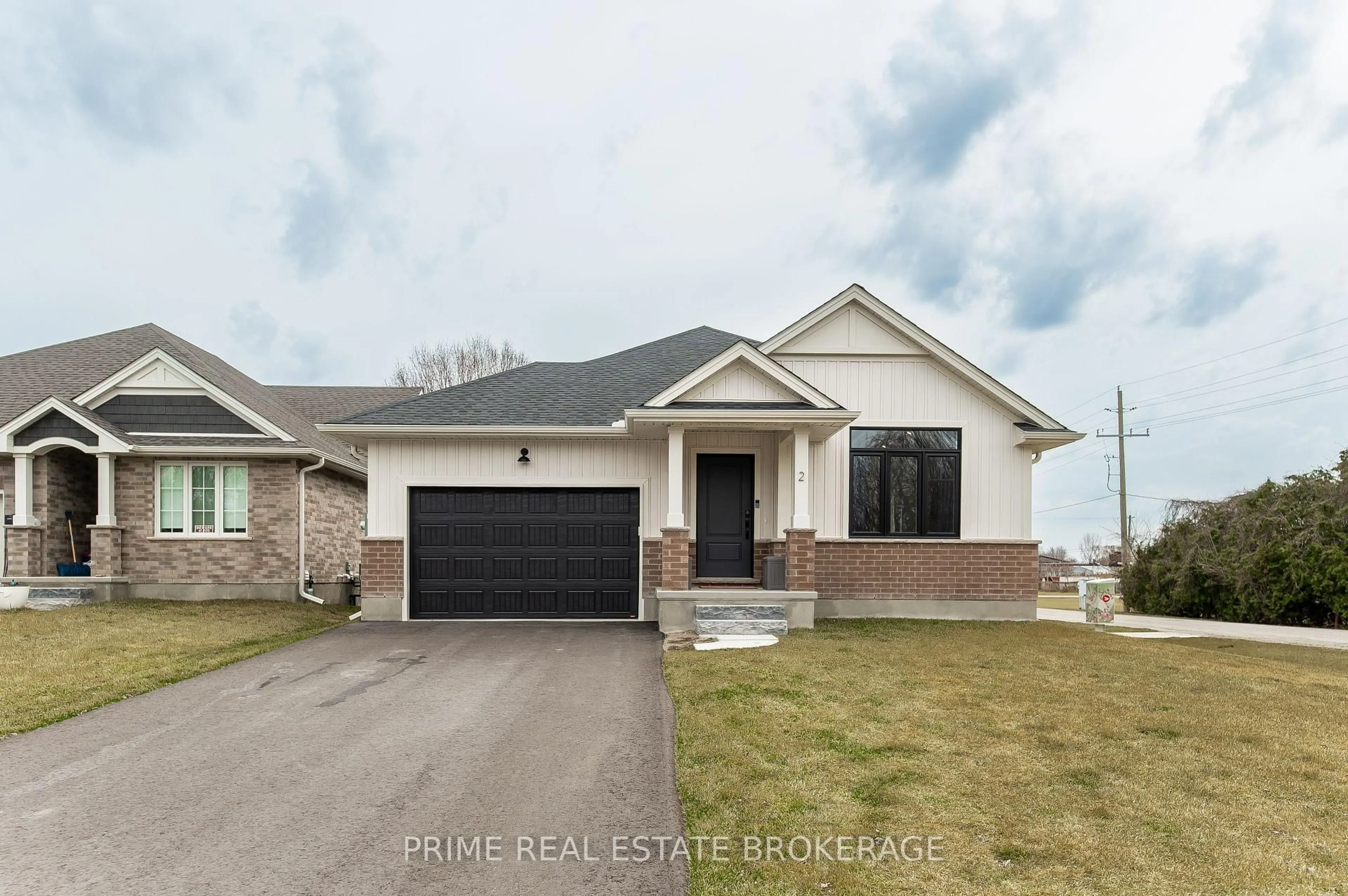 Home with brick exterior material, street for 2 Macleod Crt, West Elgin Ontario N0L 2P0
