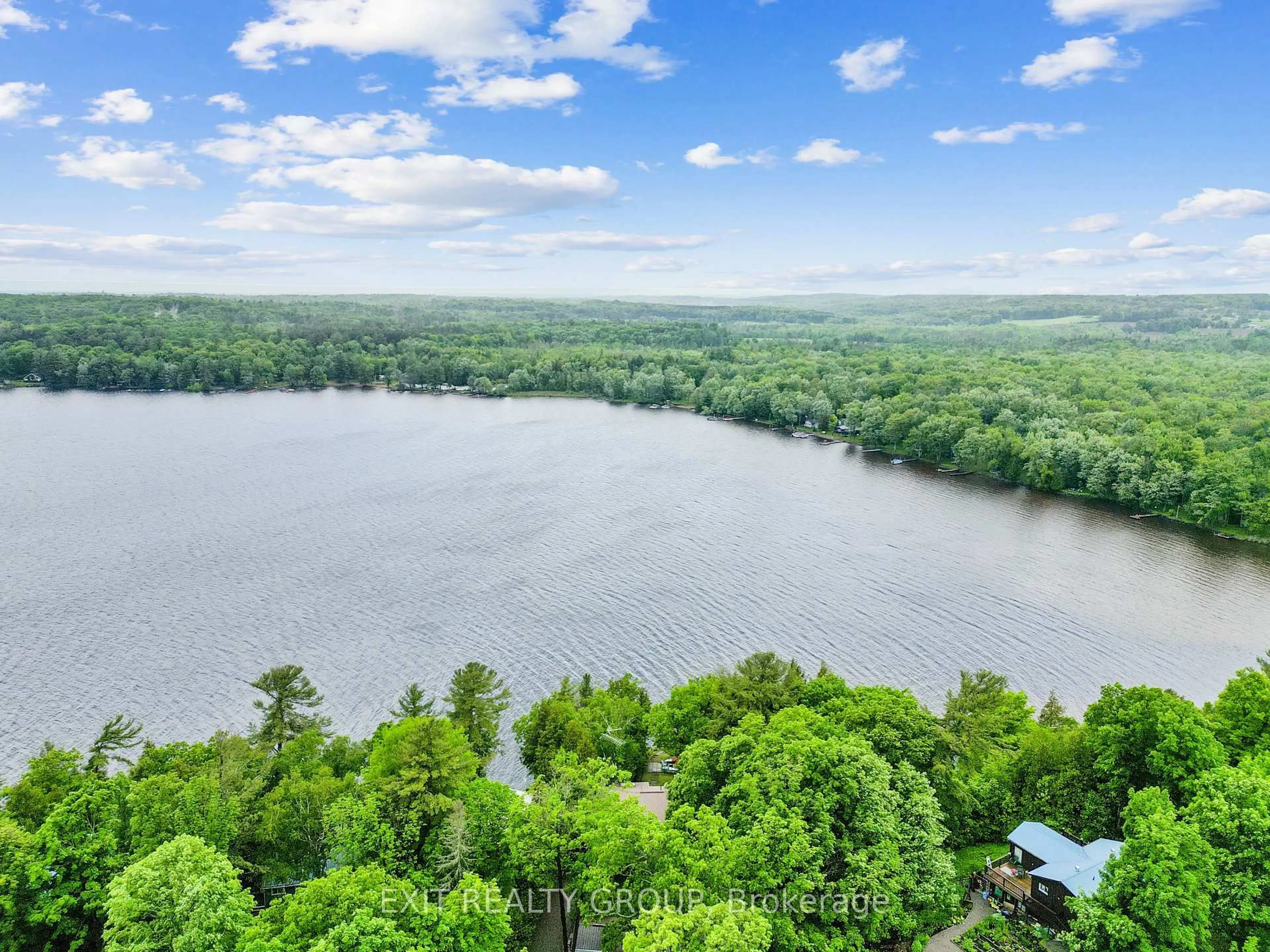 A pic from outside/outdoor area/front of a property/back of a property/a pic from drone, water/lake/river/ocean view for 734 Marble Point Rd, Limoges Ontario K0K 2M0