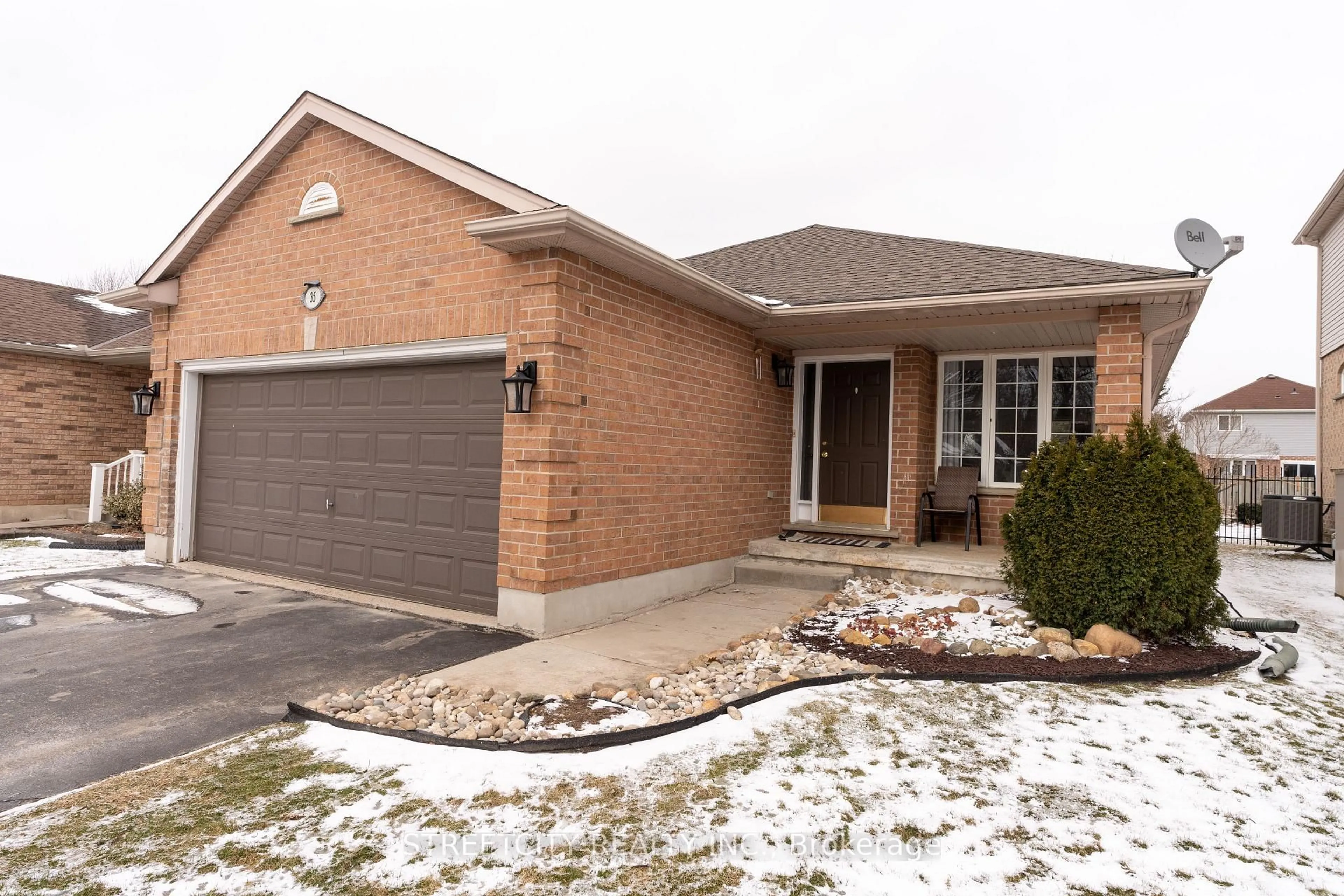 Home with brick exterior material, street for 35 Juniper Cres, Strathroy-Caradoc Ontario N7G 4G4