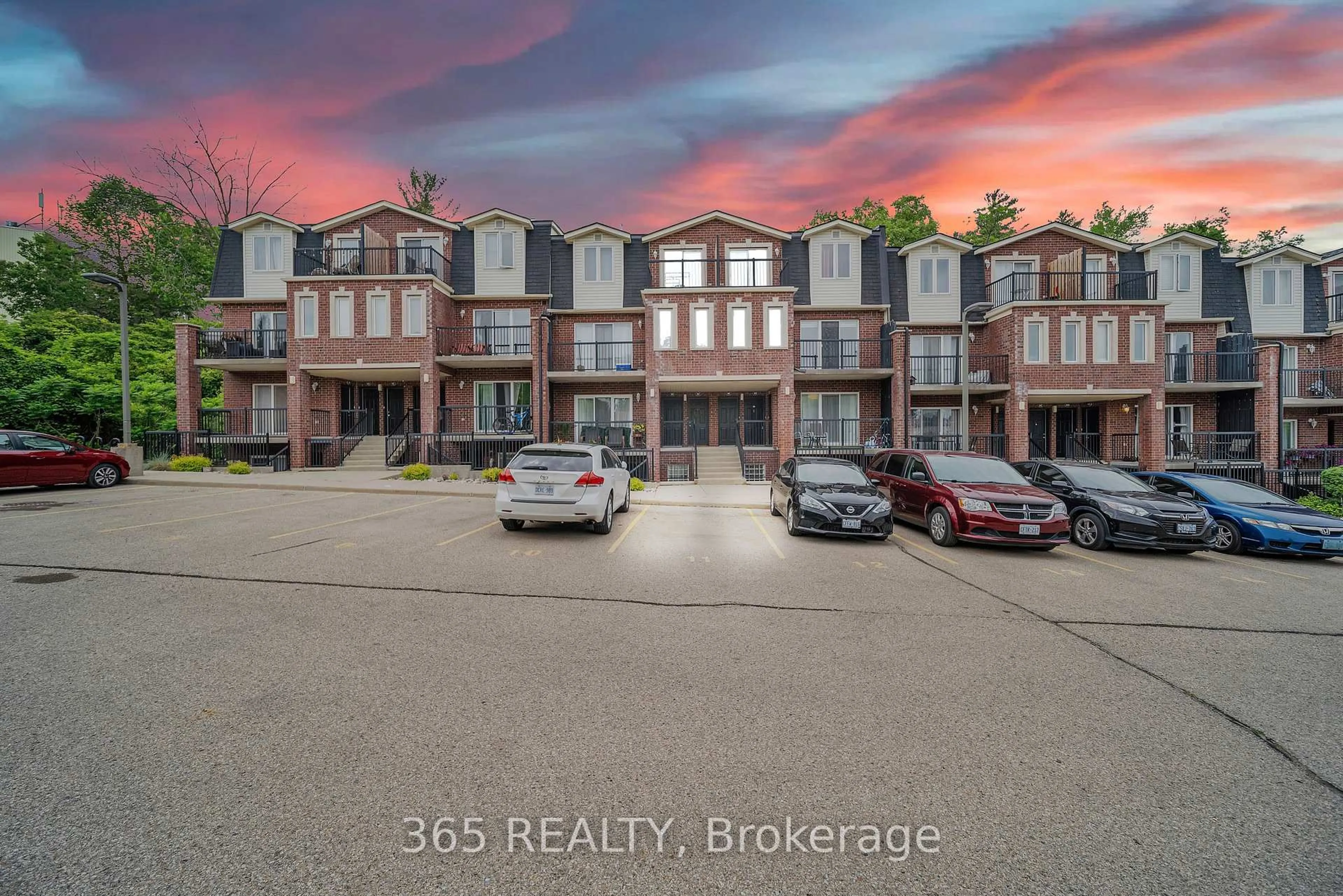 A pic from outside/outdoor area/front of a property/back of a property/a pic from drone, unknown for 45 Cedarhill Cres #4D, Kitchener Ontario N2E 0A2