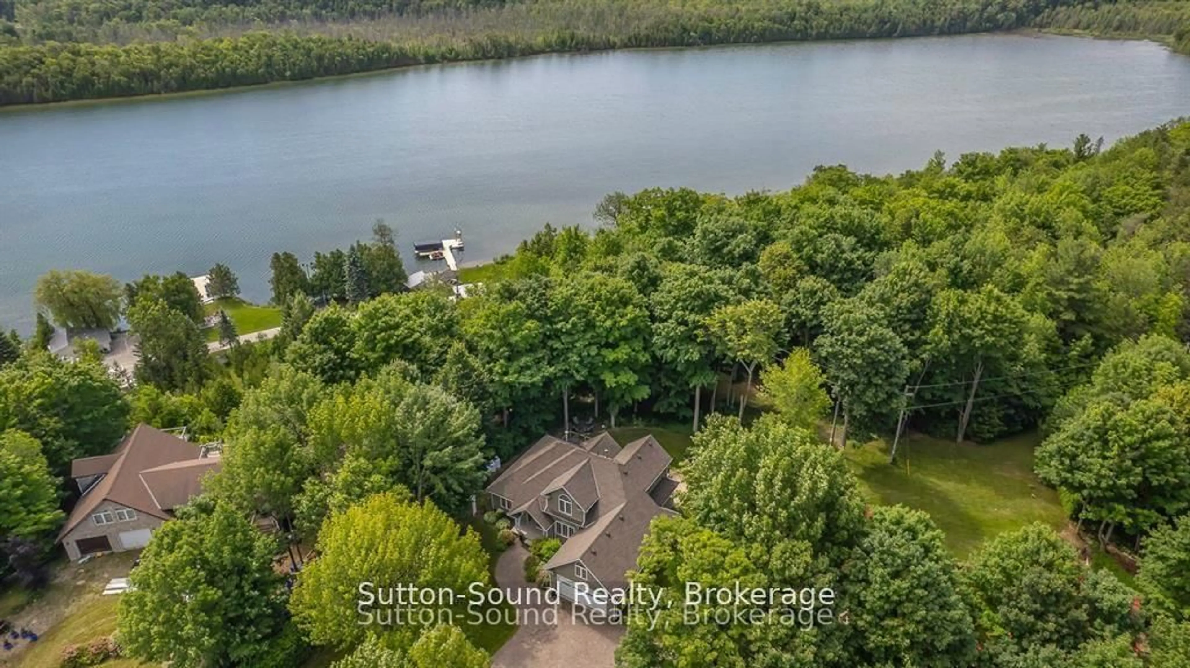 A pic from outside/outdoor area/front of a property/back of a property/a pic from drone, water/lake/river/ocean view for 124 Golden Pond Dr, South Bruce Peninsula Ontario N0H 2T0