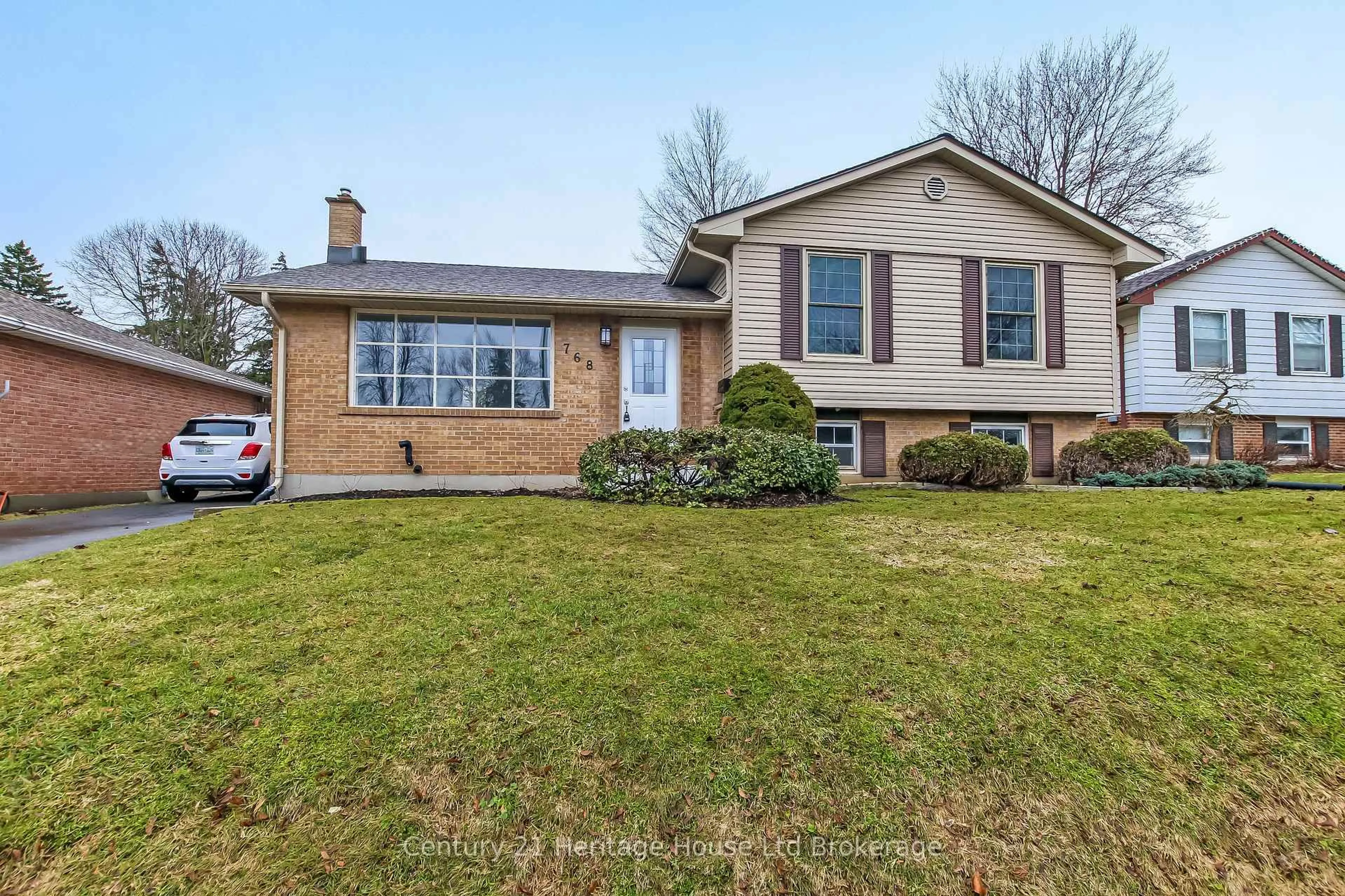 Home with brick exterior material, street for 768 Gladstone Dr, Woodstock Ontario N4S 5S9