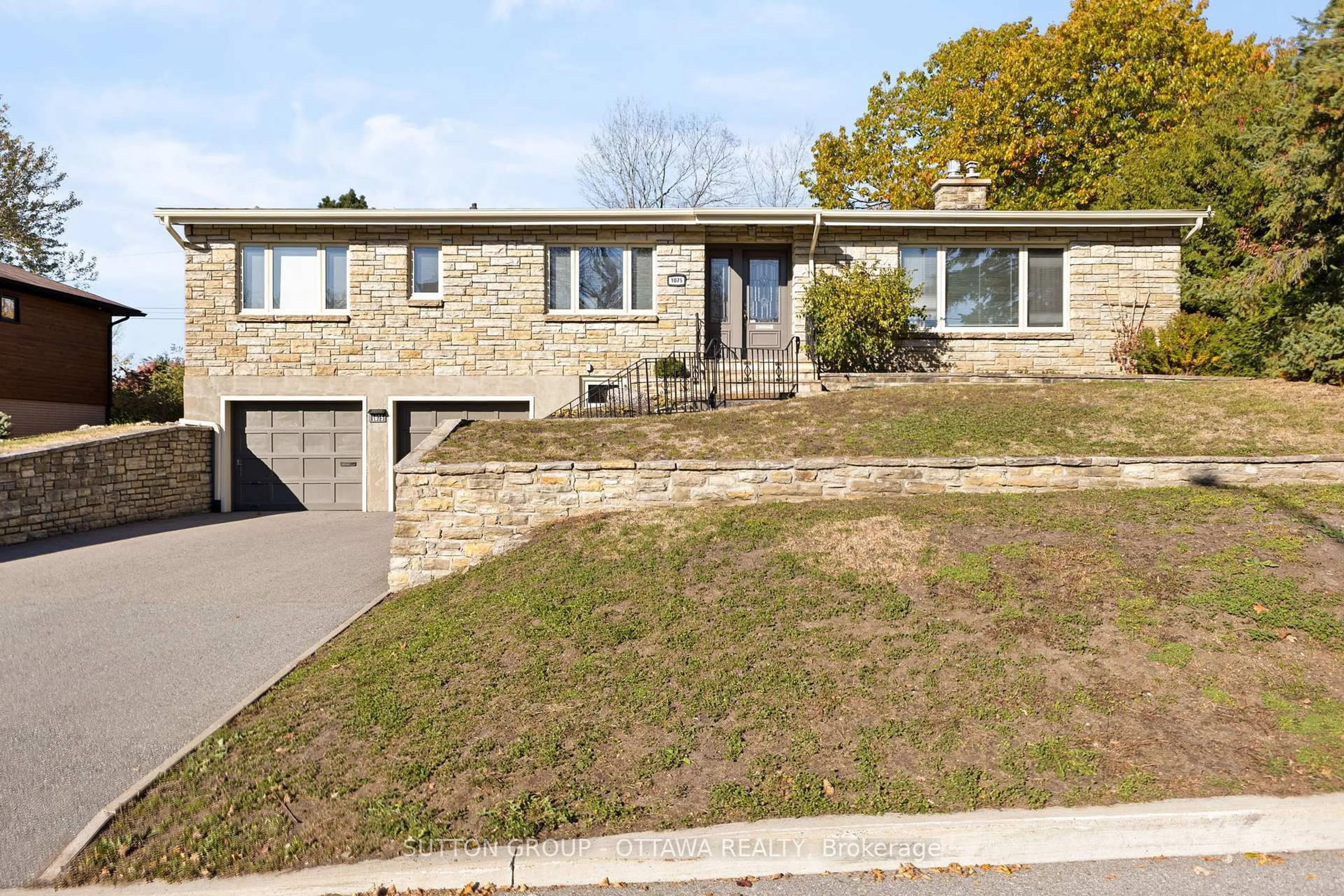 Home with brick exterior material, street for 1075 Chelsea St, Ottawa Ontario K1K 0M7