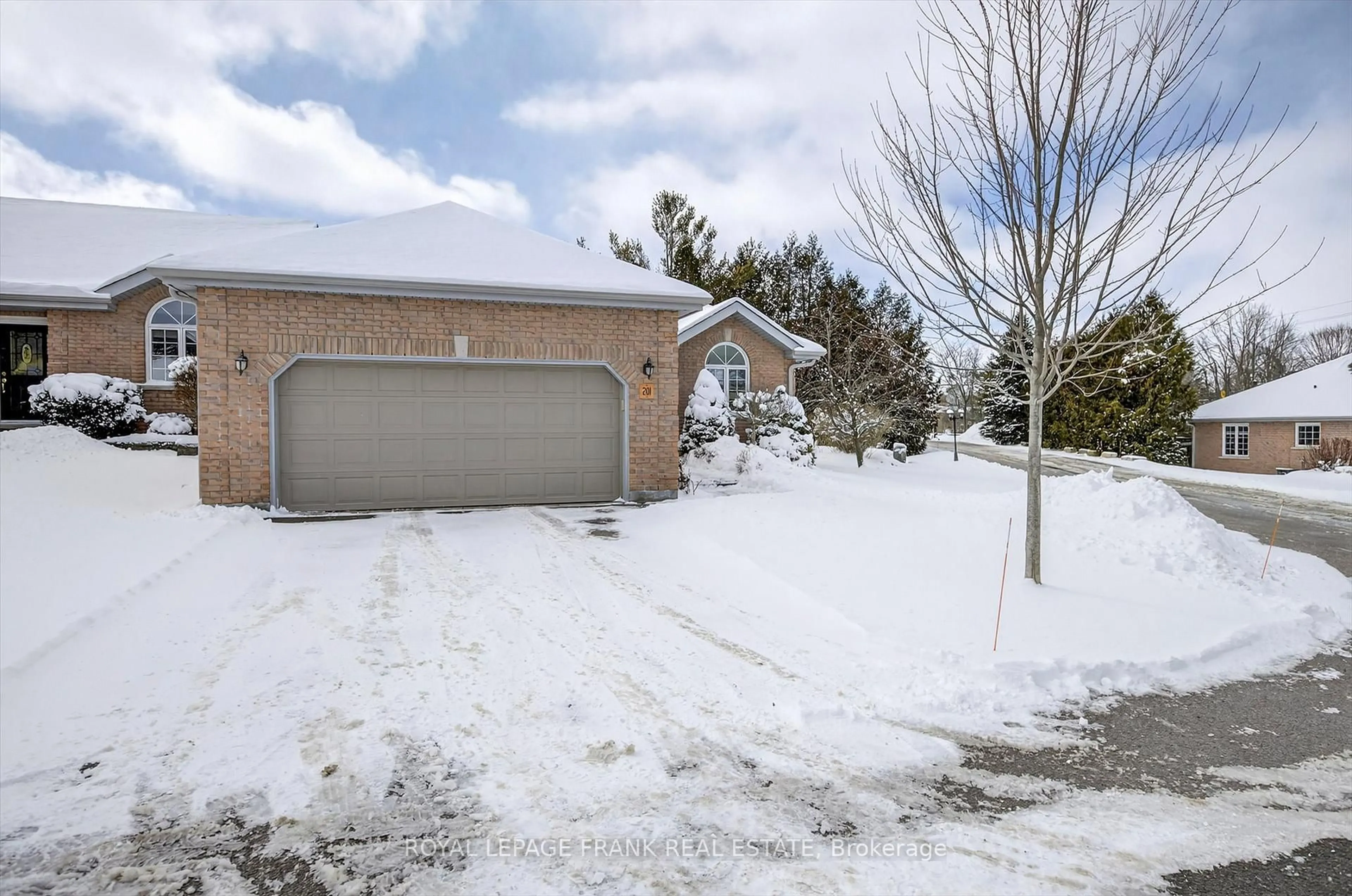 A pic from outside/outdoor area/front of a property/back of a property/a pic from drone, street for 1742 Ravenwood Dr #201, Peterborough Ontario K9K 2R5