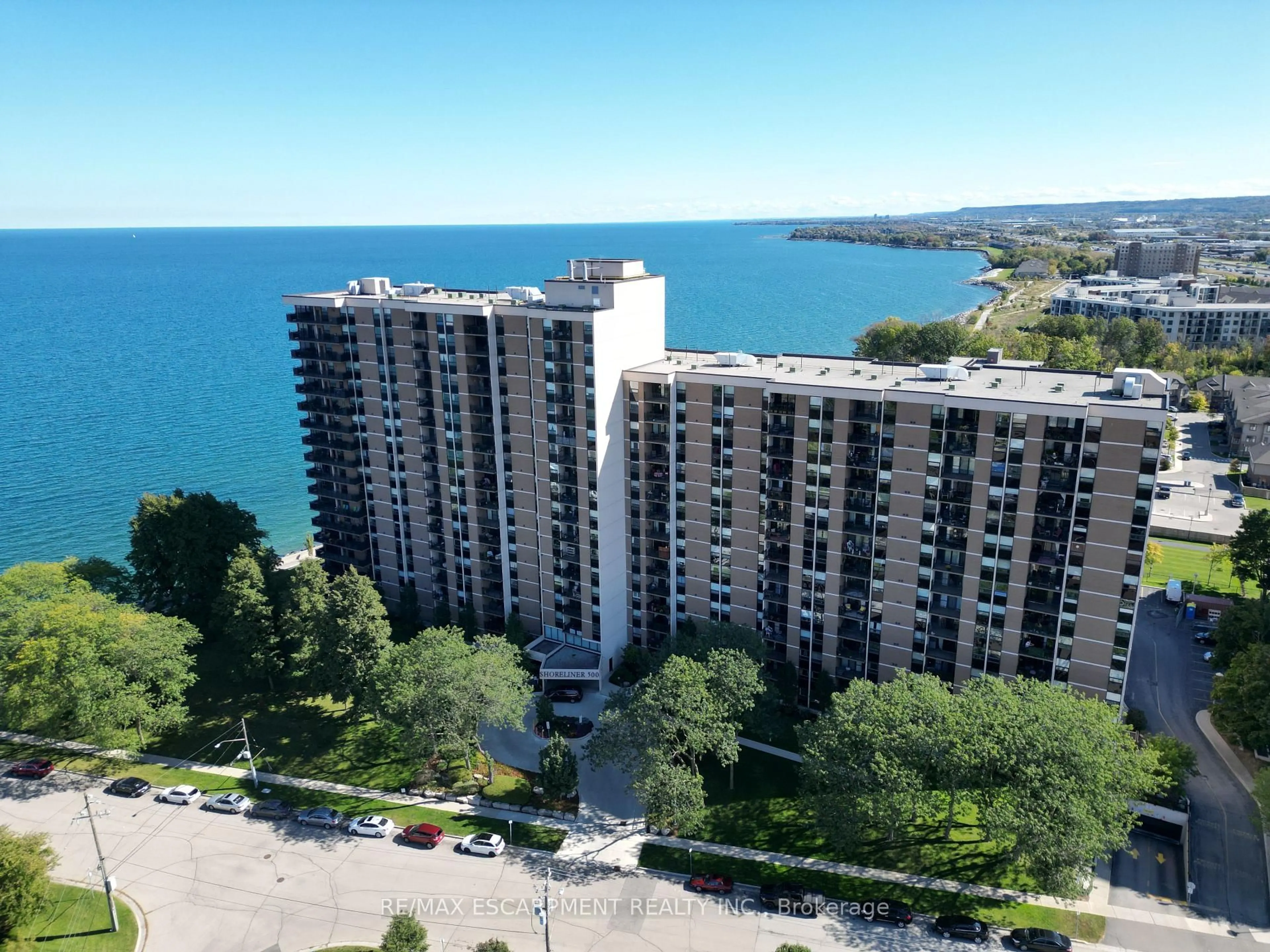 A pic from outside/outdoor area/front of a property/back of a property/a pic from drone, water/lake/river/ocean view for 500 Green Rd #214, Hamilton Ontario L8E 3M6