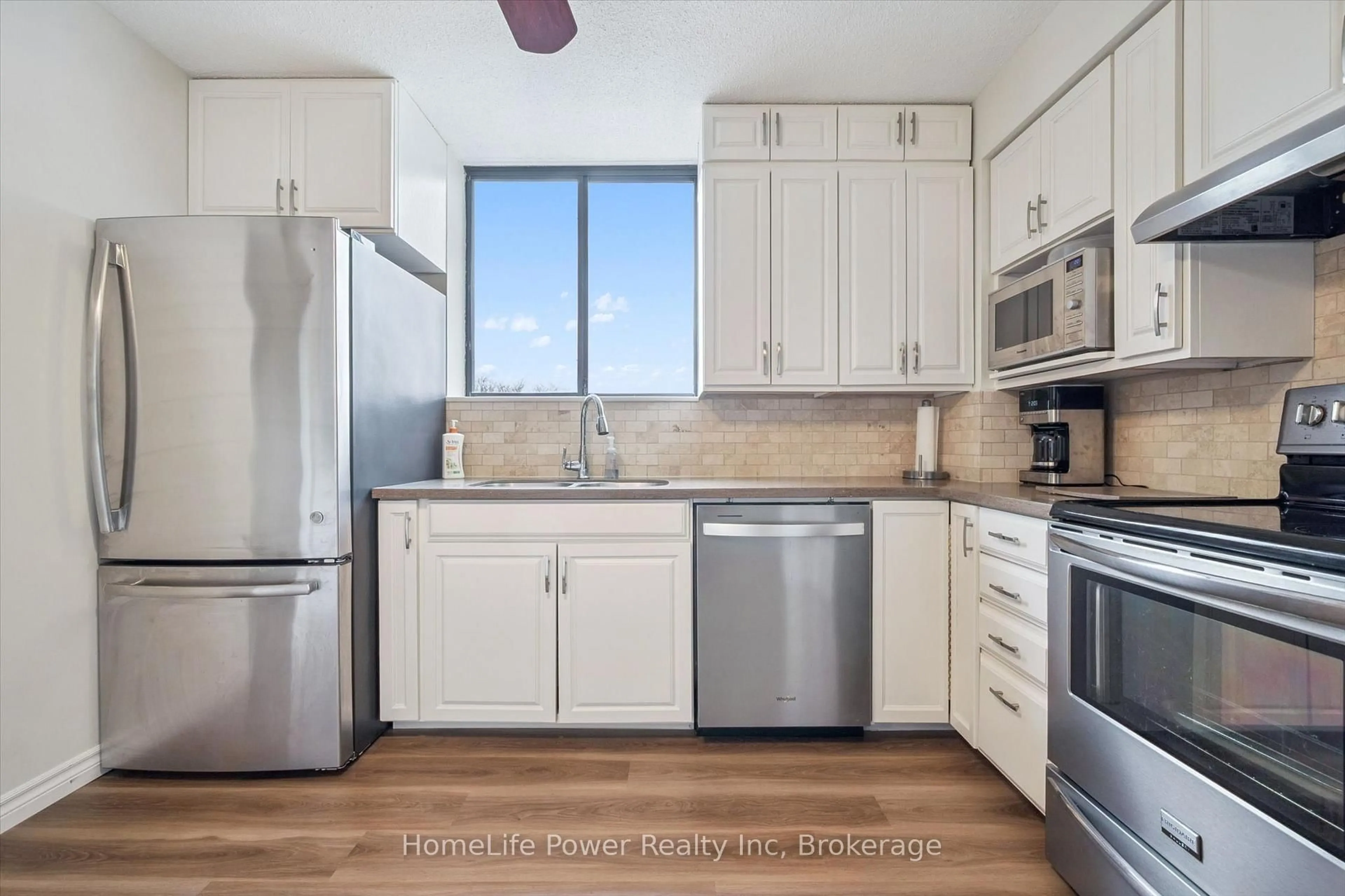 Standard kitchen, ceramic/tile floor for 93 Westwood Rd #307, Guelph Ontario N1H 7S1