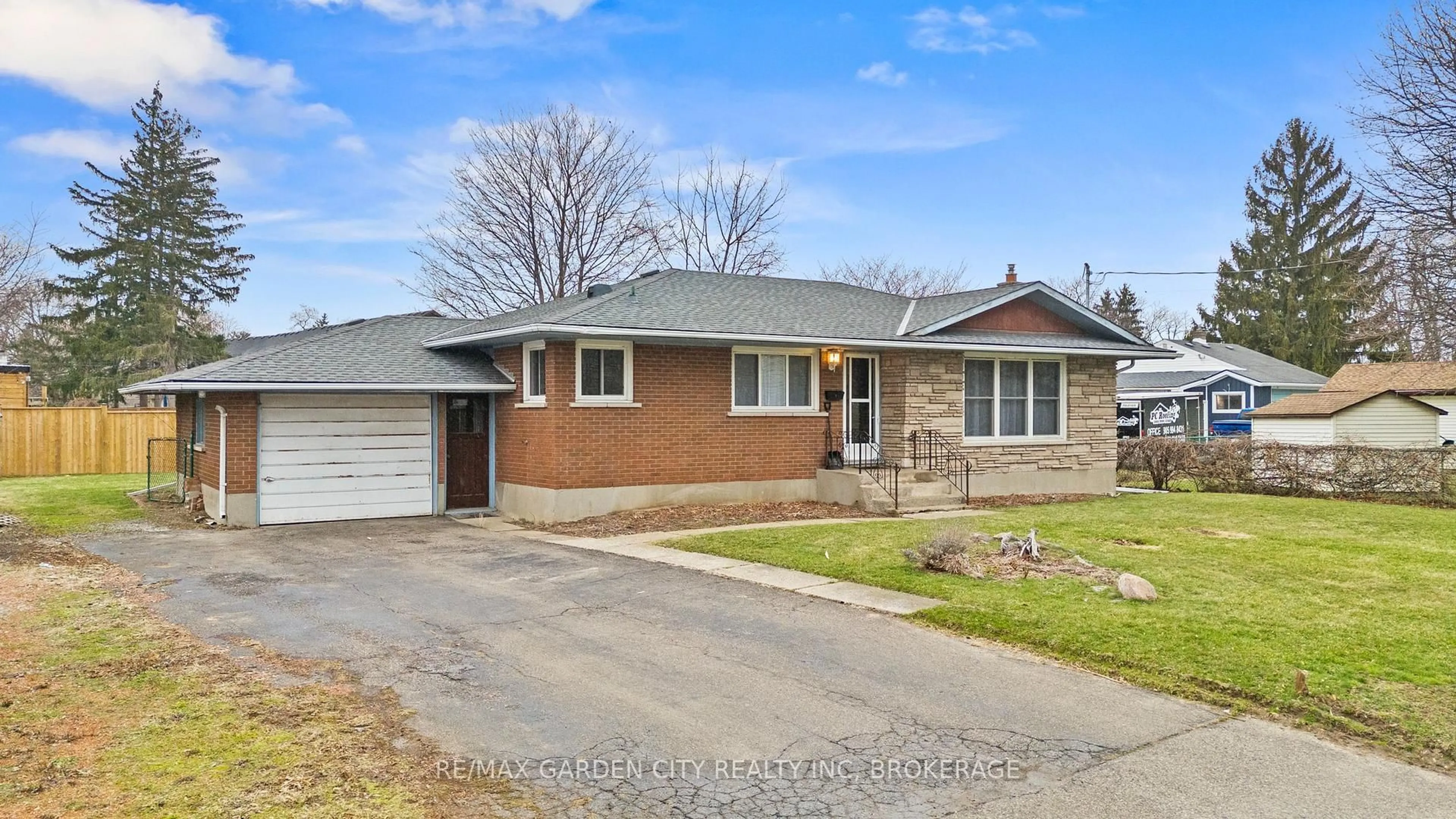 Home with brick exterior material, street for 1 GLADMAN Ave, St. Catharines Ontario L2N 4A2