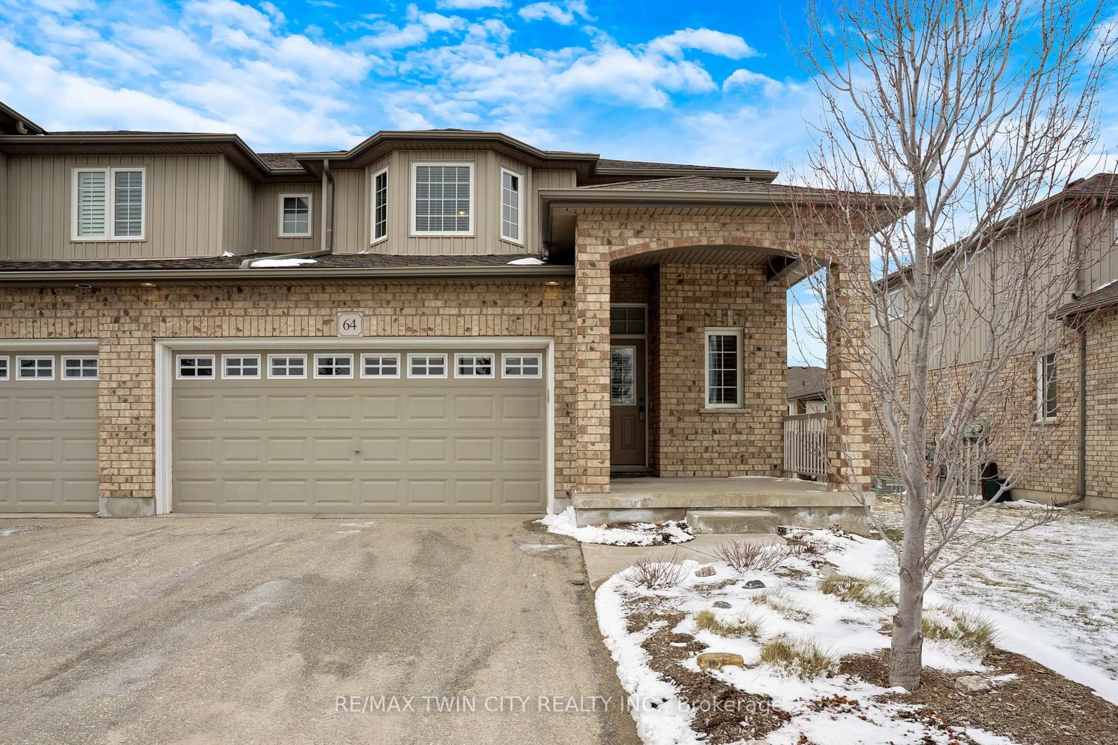 Home with brick exterior material, street for 31 Townsend Dr #64, Woolwich Ontario N0B 1M0