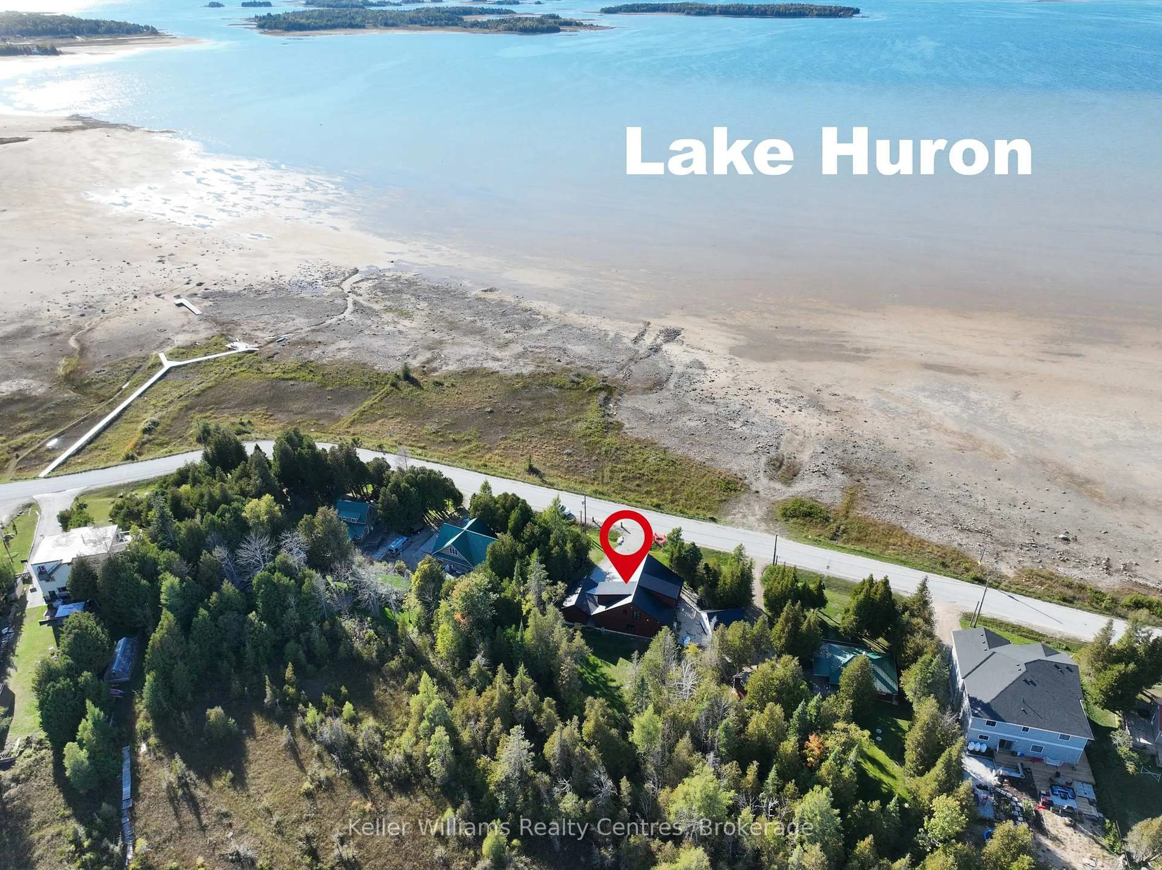A pic from outside/outdoor area/front of a property/back of a property/a pic from drone, water/lake/river/ocean view for 315 SHORELINE Ave, South Bruce Peninsula Ontario N0H 2T0