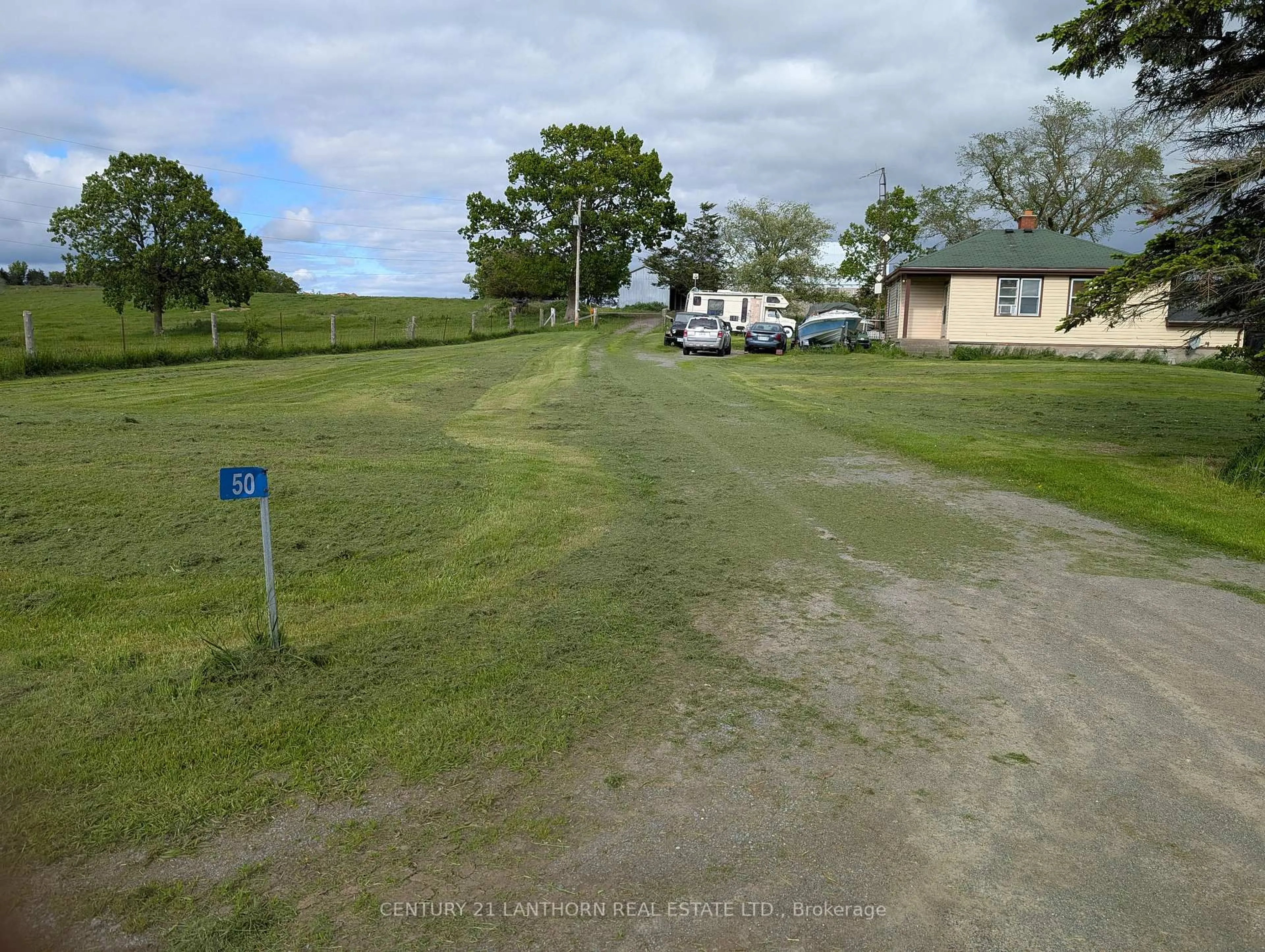 A pic from outside/outdoor area/front of a property/back of a property/a pic from drone, street for 50 Platt Rd, Trenton Ontario K8V 5P8