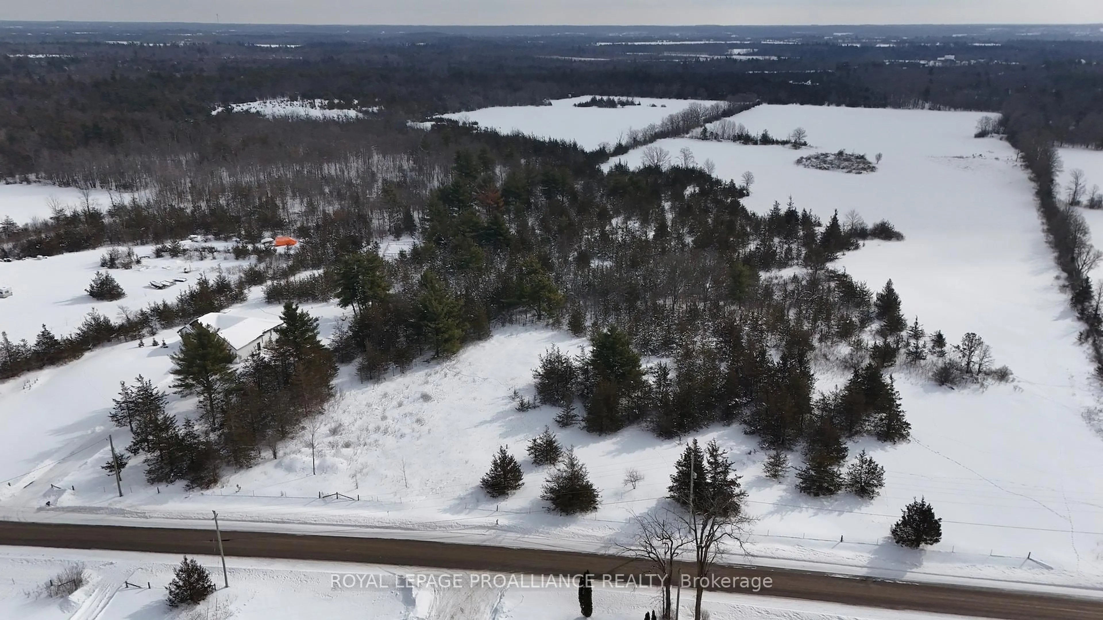 A pic from outside/outdoor area/front of a property/back of a property/a pic from drone, unknown for 102 Dewey Rd, Yarker Ontario K0K 3N0