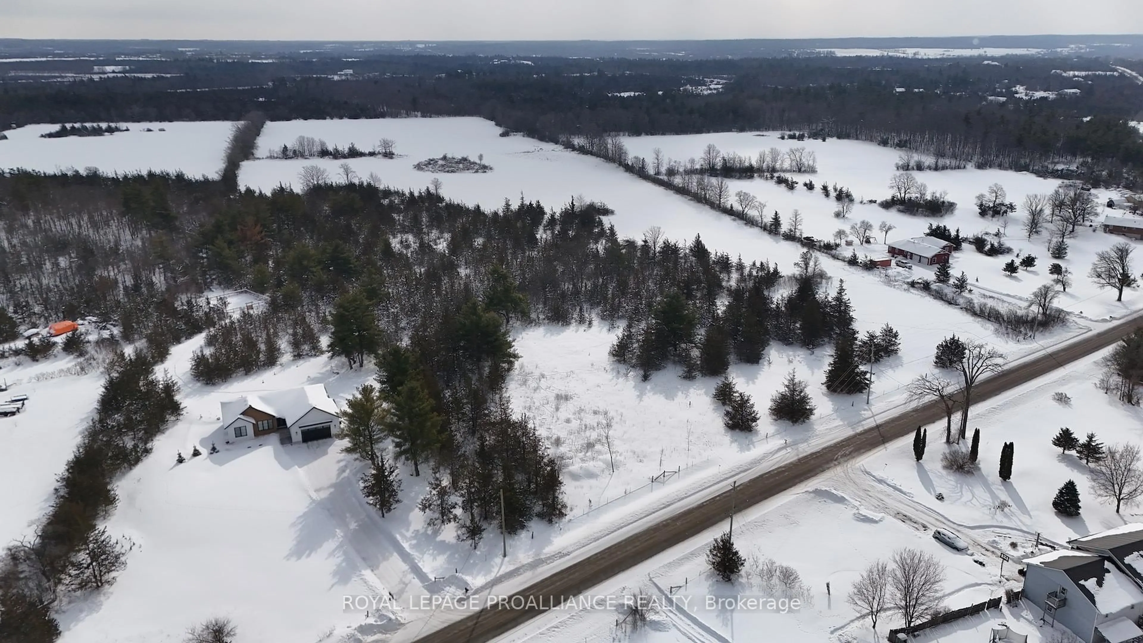 A pic from outside/outdoor area/front of a property/back of a property/a pic from drone, unknown for 102 Dewey Rd, Yarker Ontario K0K 3N0