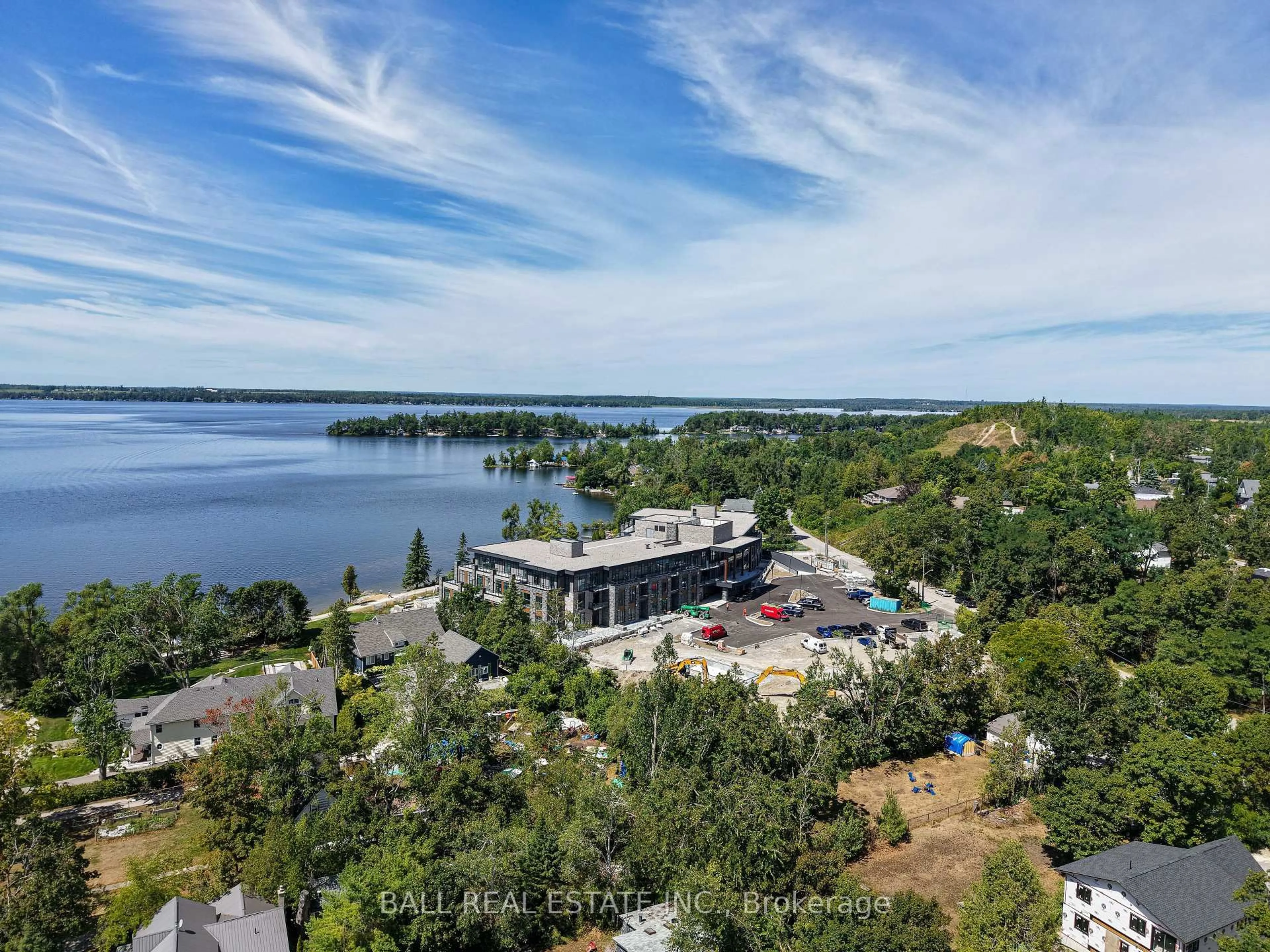A pic from outside/outdoor area/front of a property/back of a property/a pic from drone, water/lake/river/ocean view for 99 Louisa St #108, Kawartha Lakes Ontario K0M 1N0