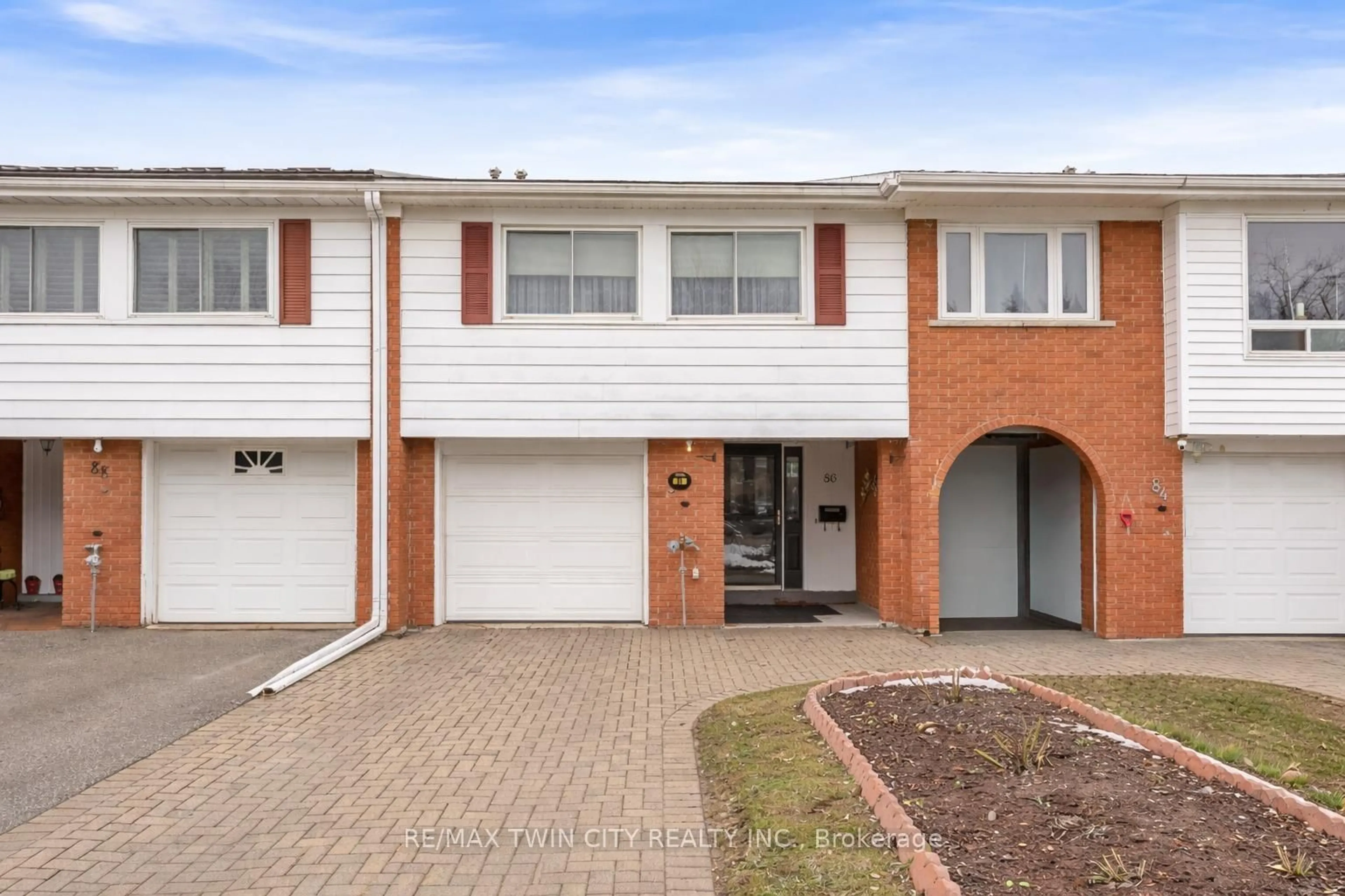 Home with brick exterior material, street for 86 Overlea Dr, Kitchener Ontario N2M 1T1