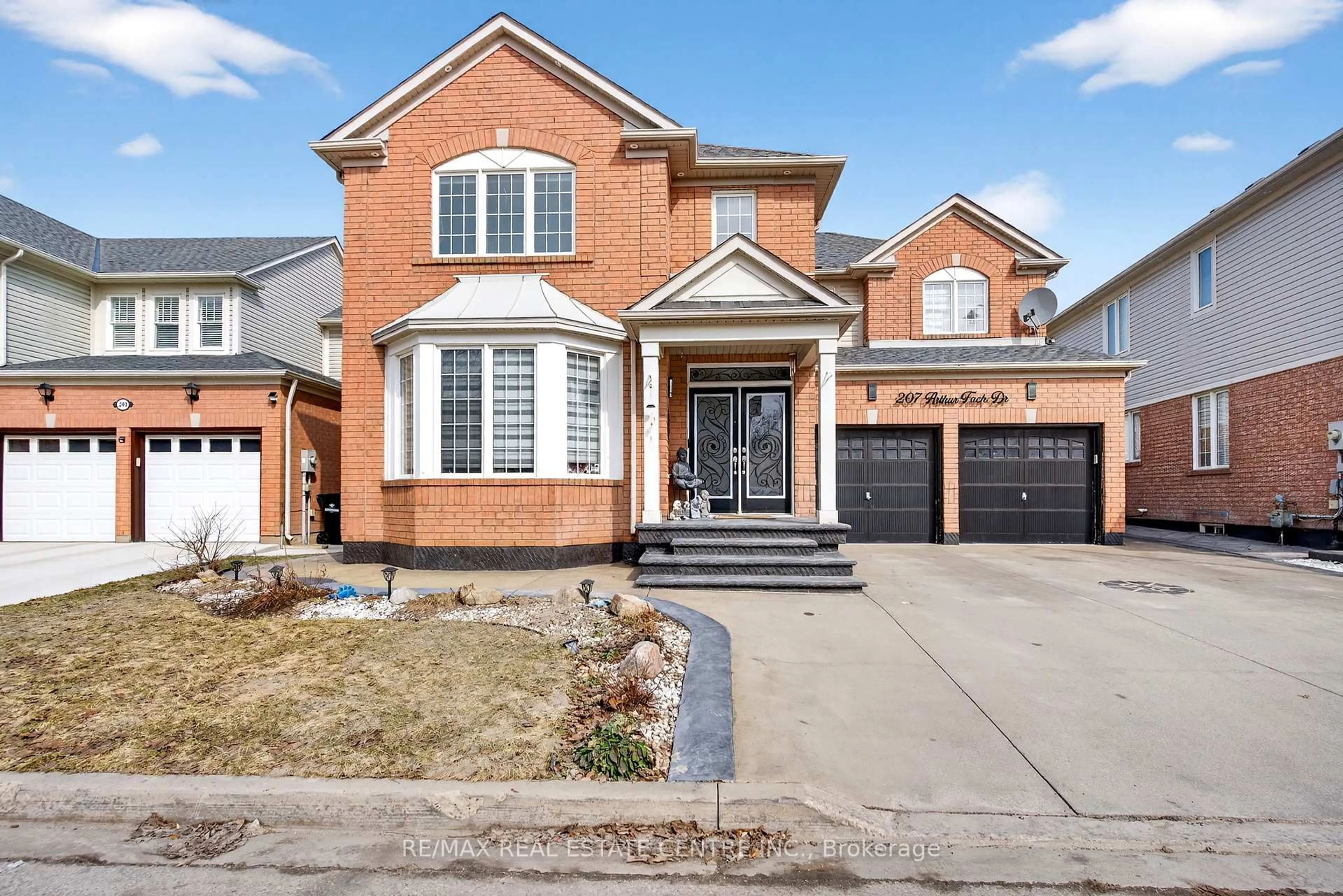 Home with brick exterior material, street for 207 Arthur Fach Dr, Cambridge Ontario N1T 2G2