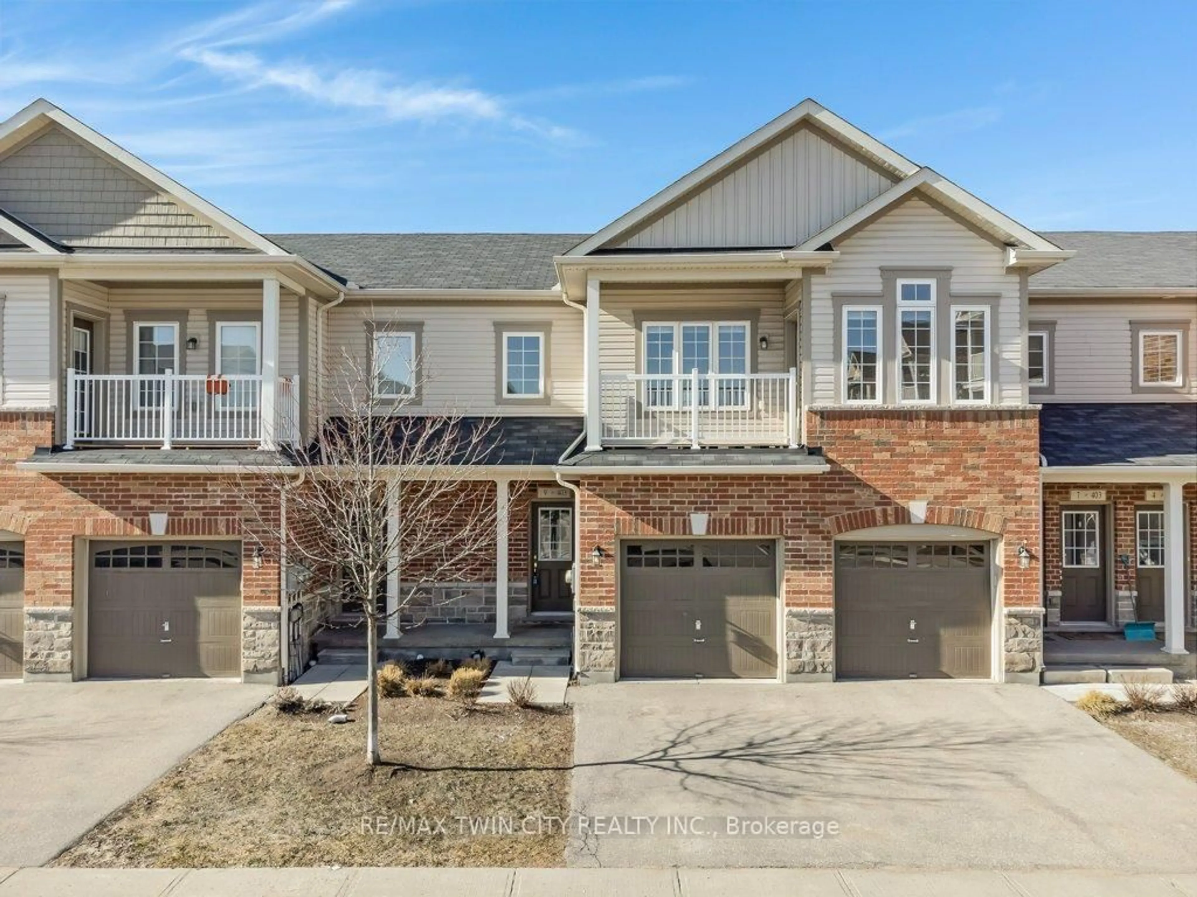 Home with brick exterior material, street for 403 Westwood Dr #9, Kitchener Ontario N2M 0B5