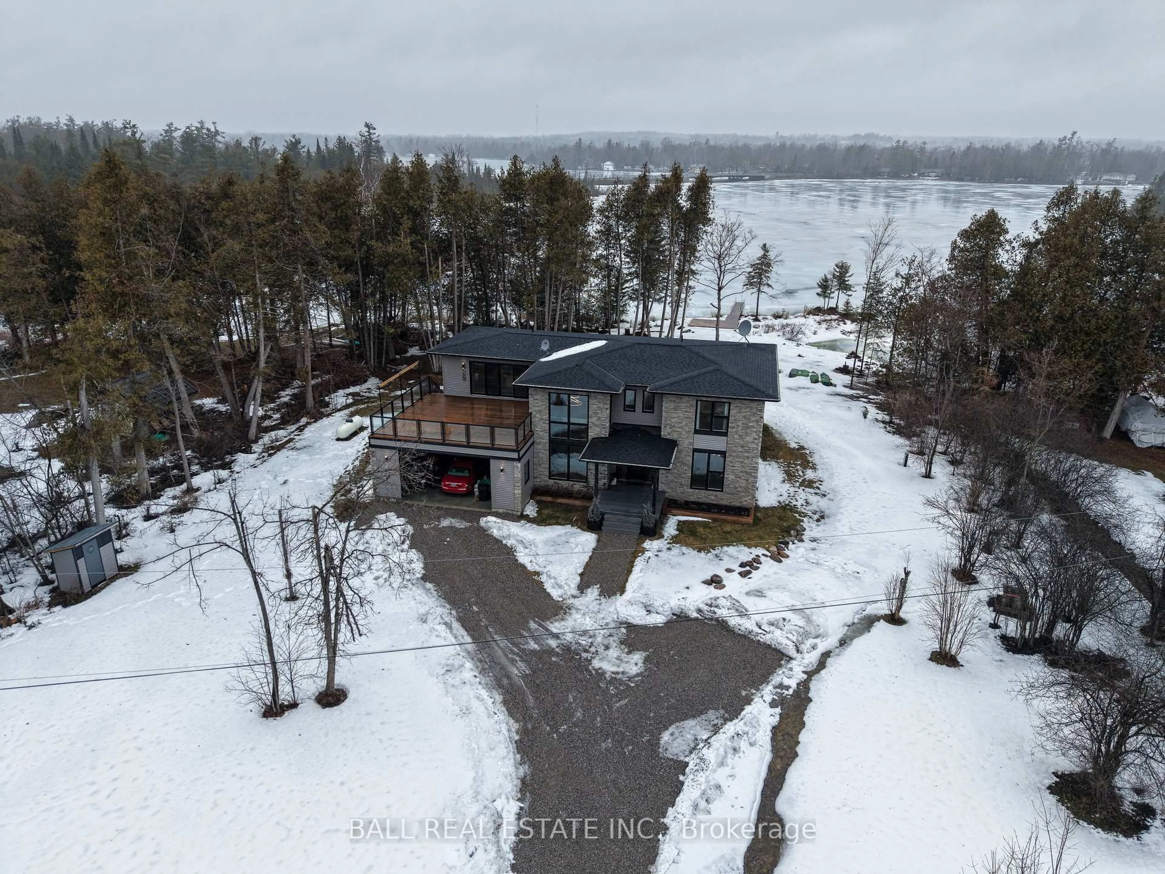 A pic from outside/outdoor area/front of a property/back of a property/a pic from drone, water/lake/river/ocean view for 15 Berry Lane, Kawartha Lakes Ontario K0M 1A0