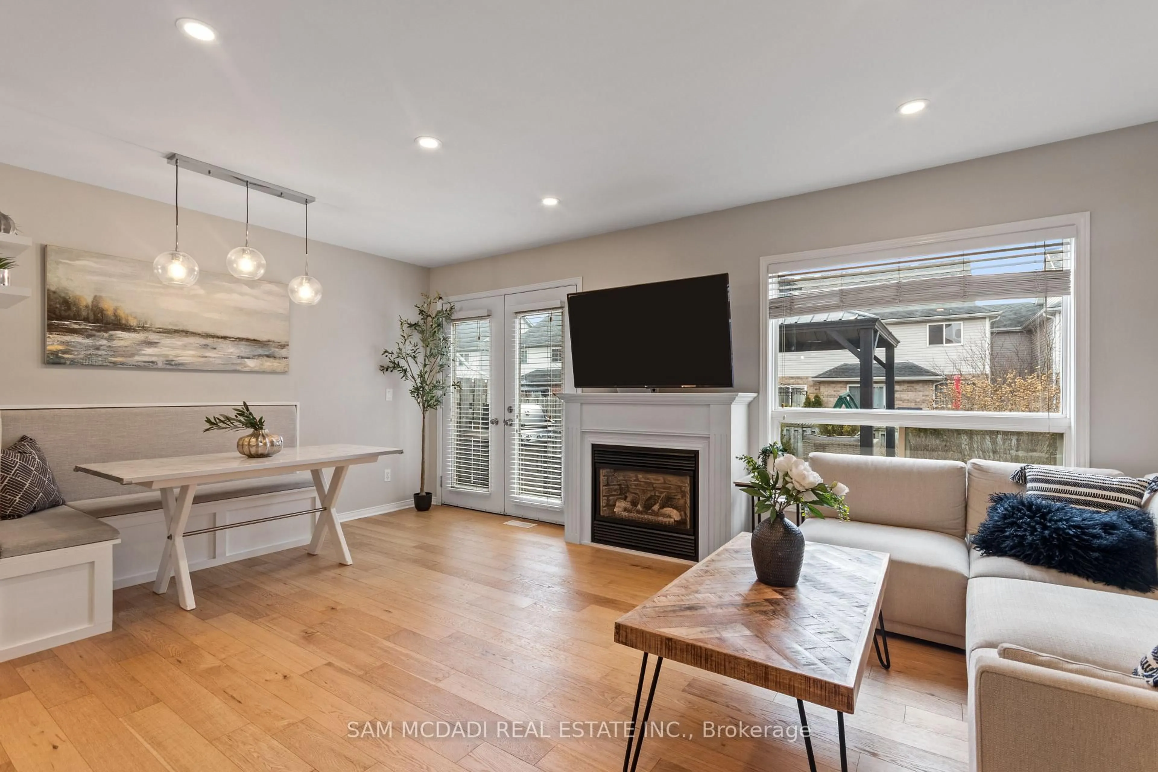 Living room with furniture, wood/laminate floor for 75 Elma Pl, Cambridge Ontario N3C 4E7