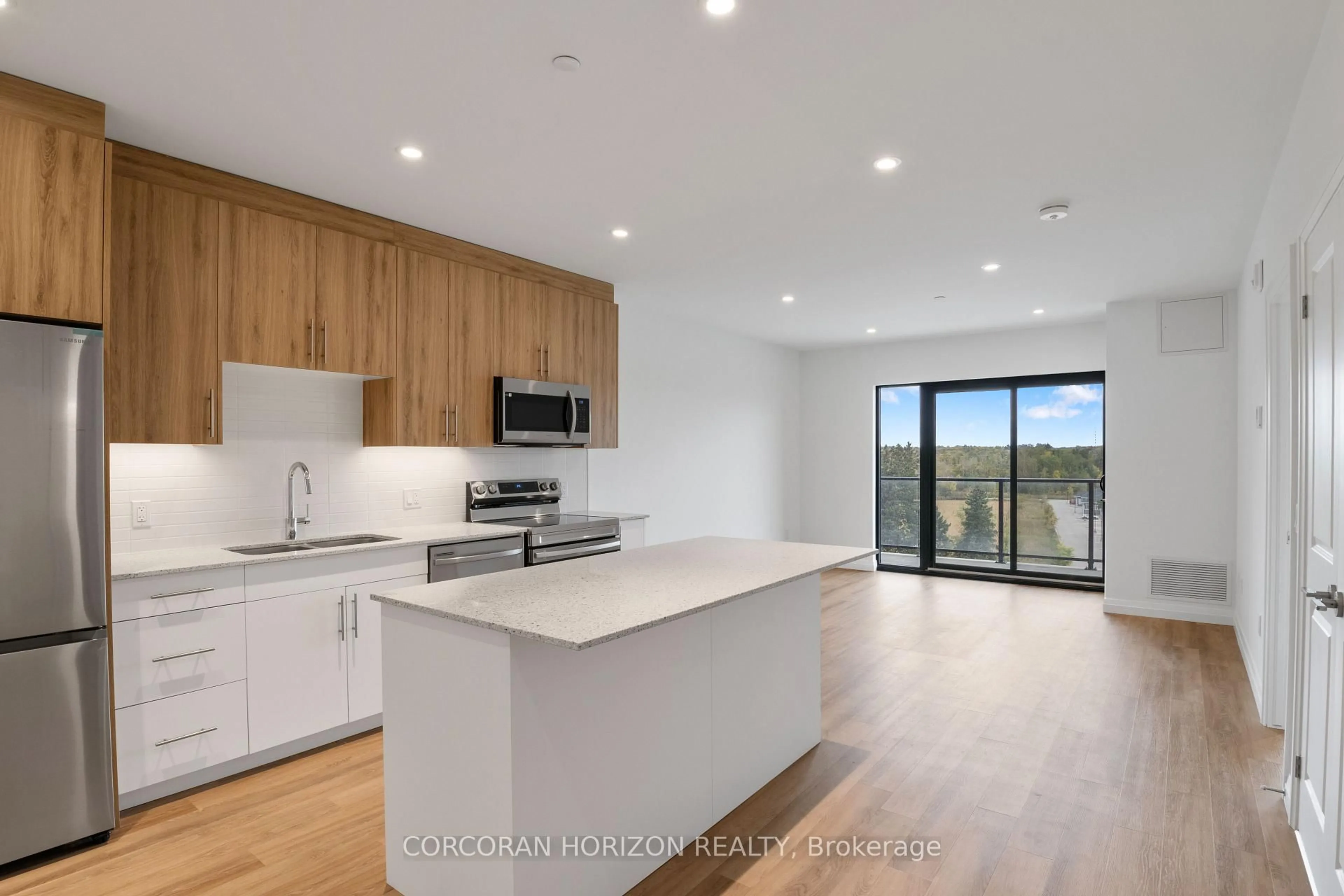 Open concept kitchen, wood/laminate floor for 525 New Dundee Rd #717, Kitchener Ontario N2P 0K8