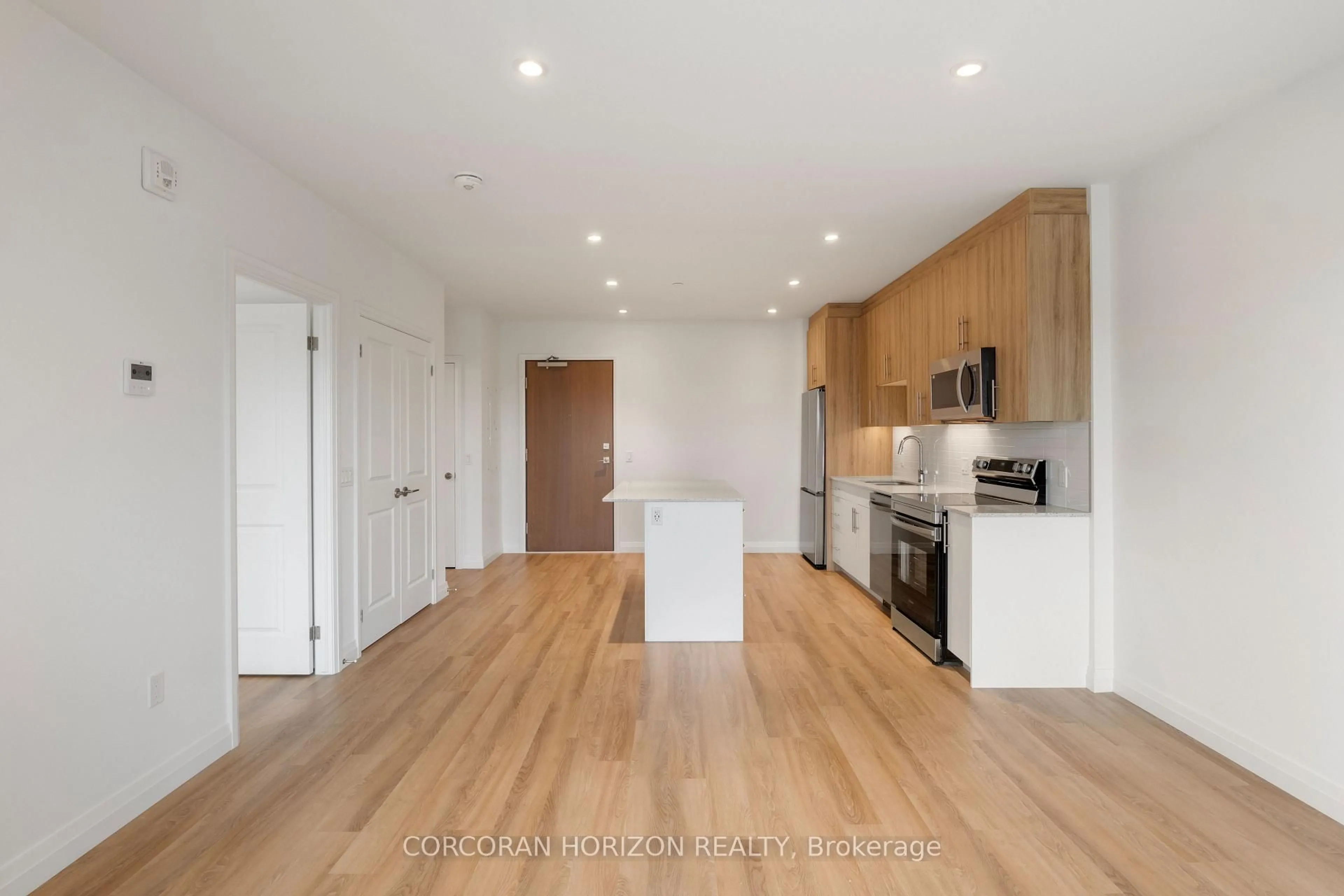 Open concept kitchen, wood/laminate floor for 525 New Dundee Rd #717, Kitchener Ontario N2P 0K8