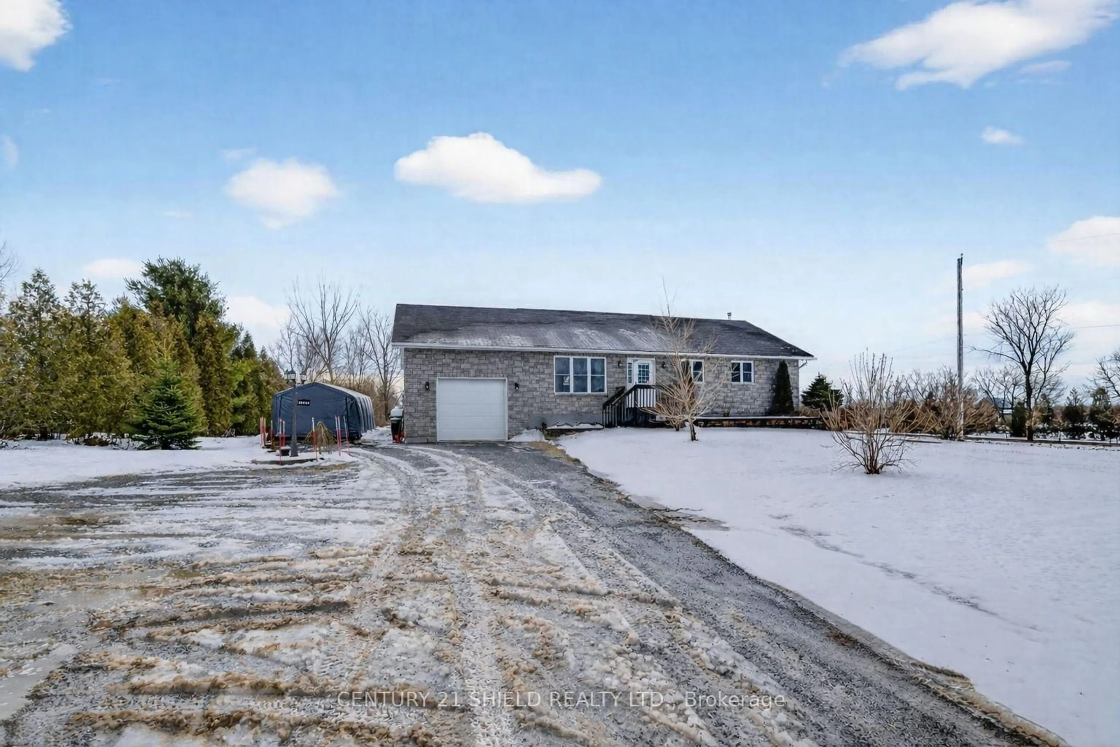 A pic from outside/outdoor area/front of a property/back of a property/a pic from drone, street for 17410 McPhail Rd, South Stormont Ontario K0C 2A0