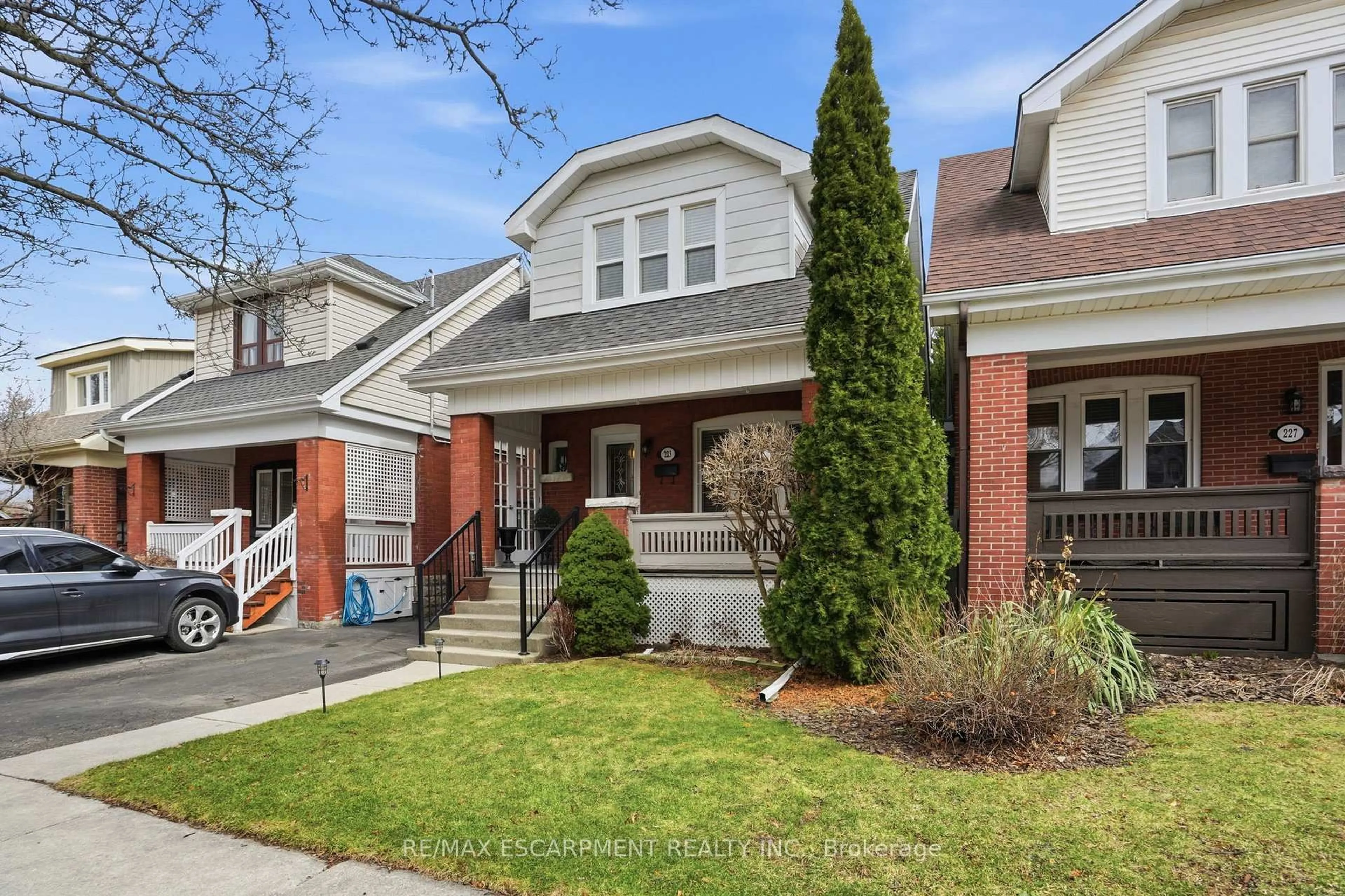 Home with brick exterior material, street for 223 Park Row, Hamilton Ontario L8K 2K4