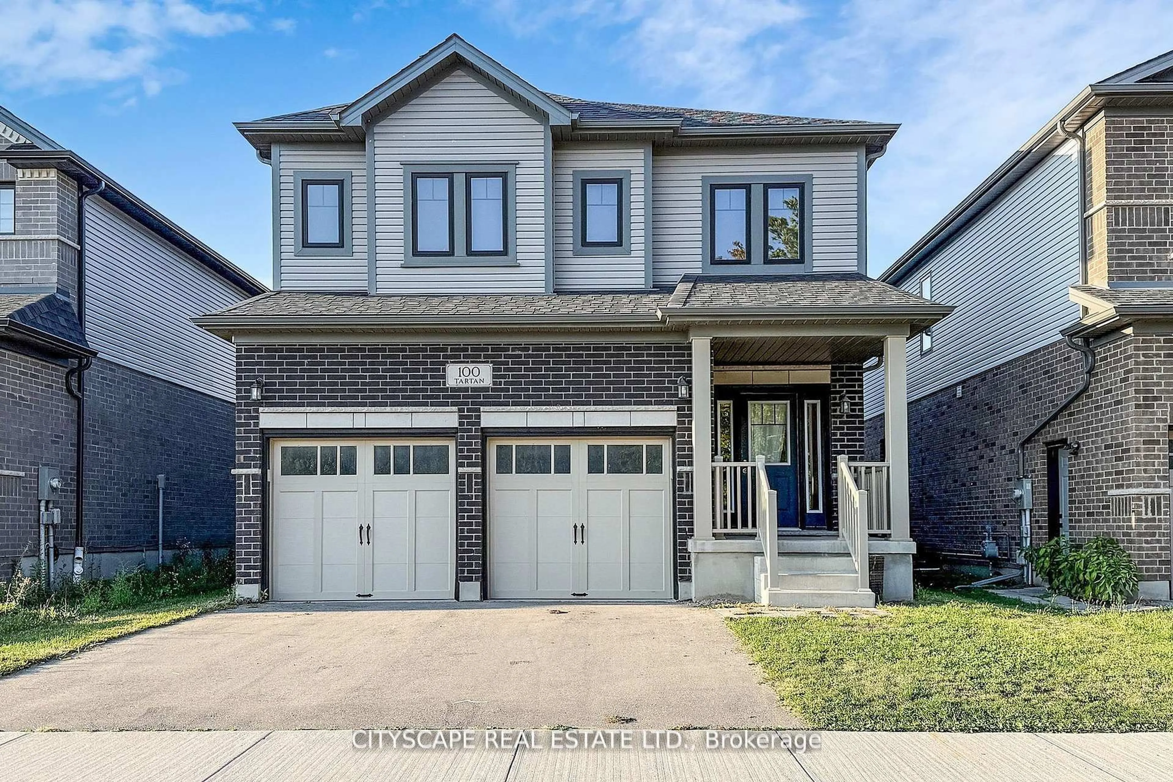 Home with brick exterior material, street for 100 Tartan Ave, Kitchener Ontario N2R 0N5