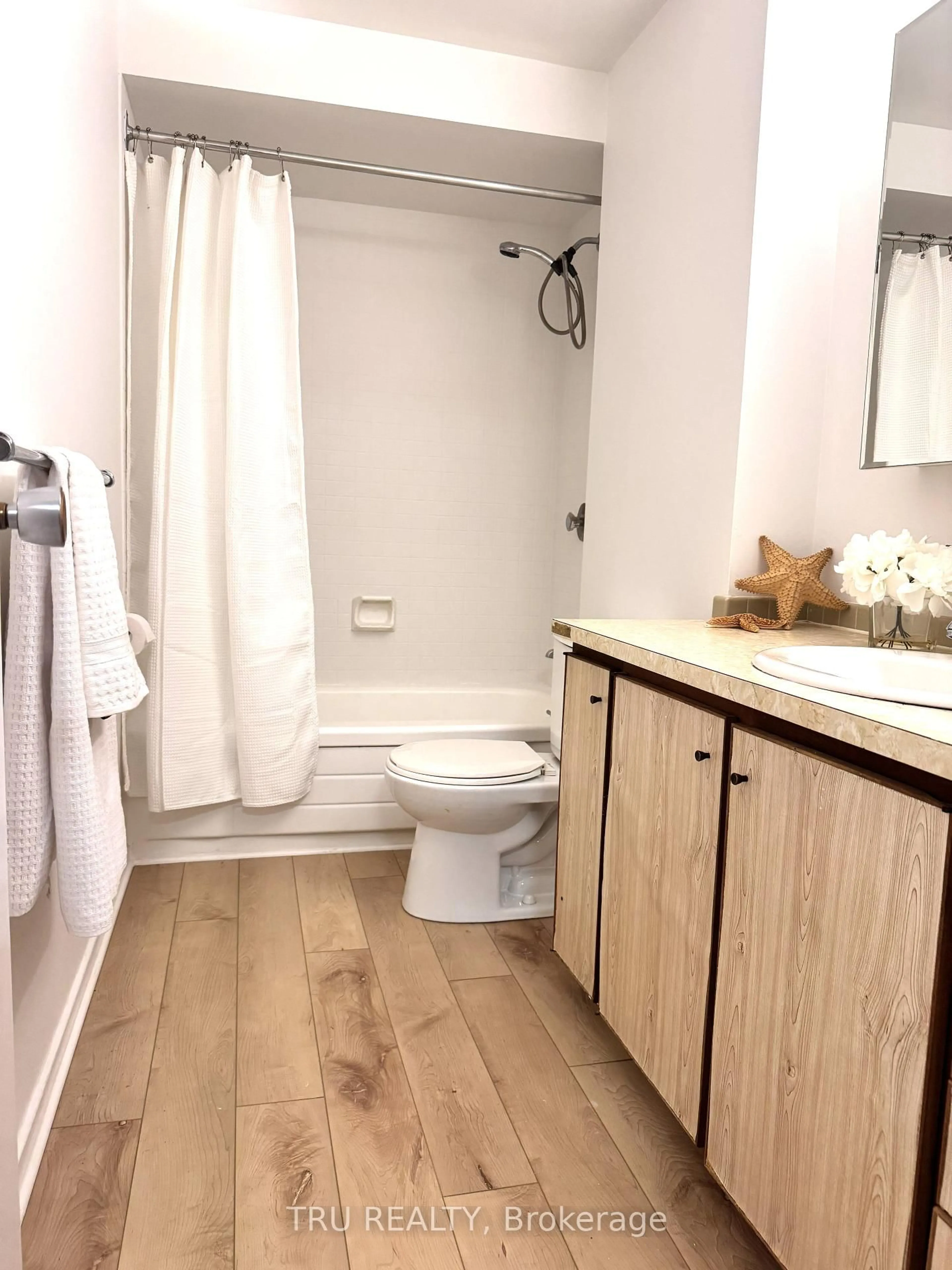 Standard bathroom, wood/laminate floor for 3100 Carling Ave #706, Ottawa Ontario K2B 6J6