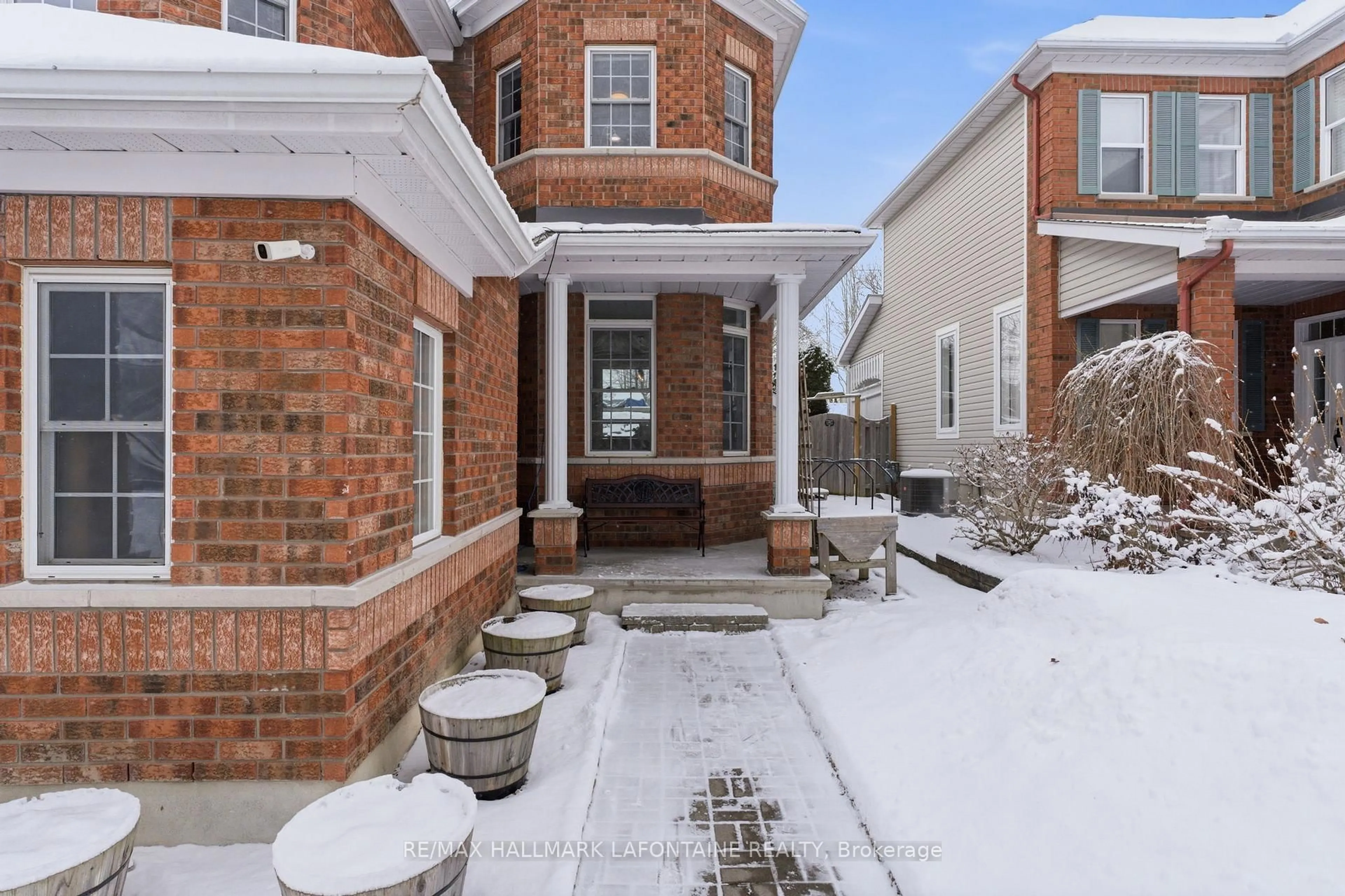 Home with brick exterior material, street for 60 Hemlo Cres, Ottawa Ontario K2T 1C9