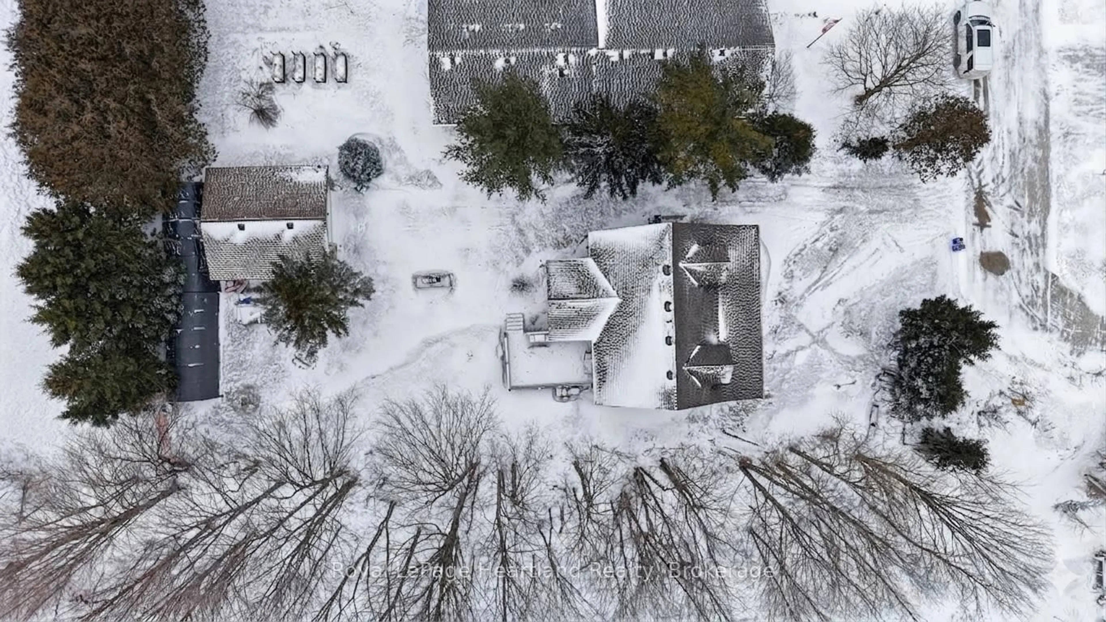 A pic from outside/outdoor area/front of a property/back of a property/a pic from drone, street for 25 JOHN St, Minto Ontario N0G 1M0