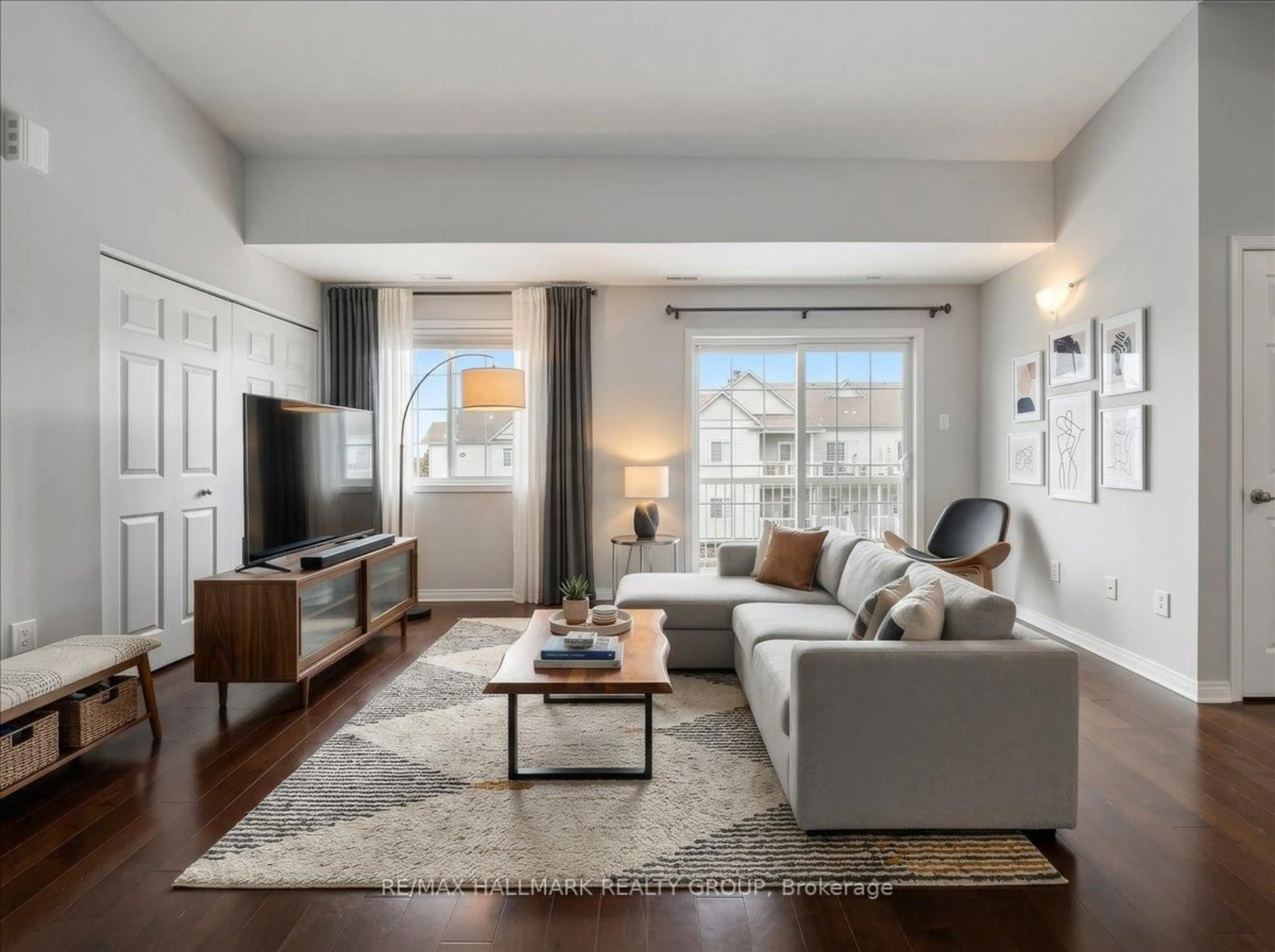 Living room with furniture, unknown for 102 Artesa Private #I, Ottawa Ontario K2S 0J8