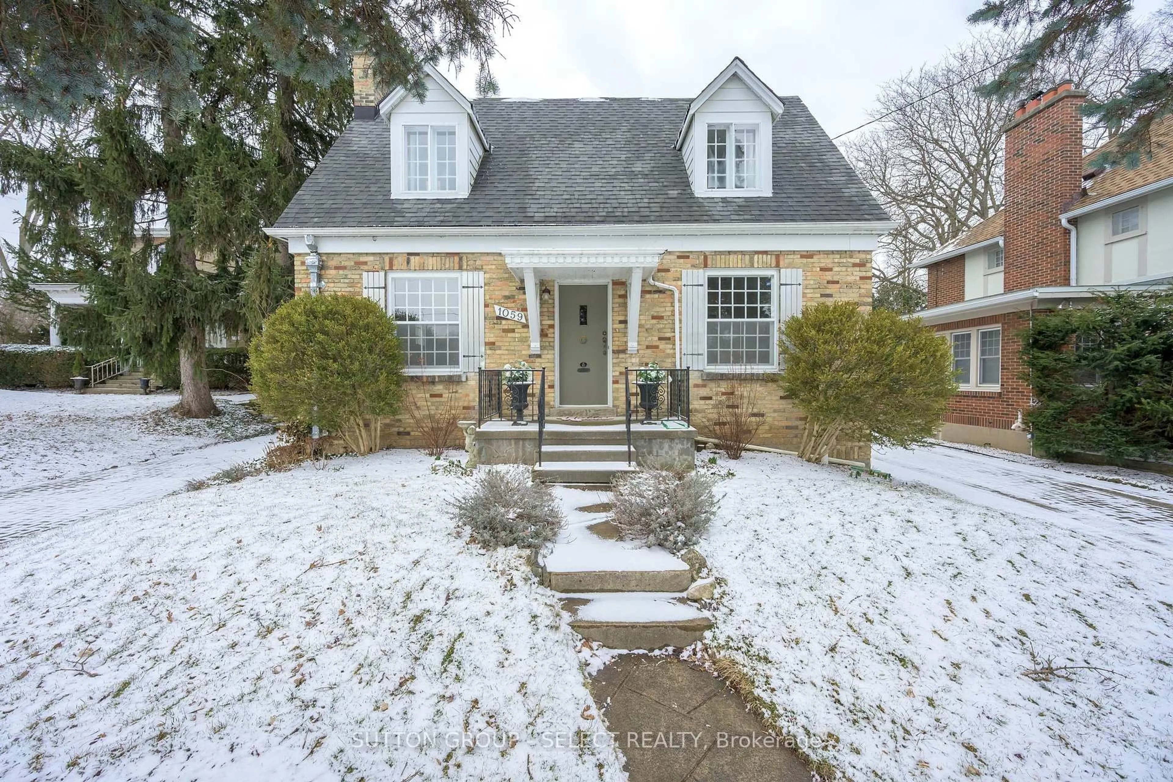 Home with brick exterior material, street for 1059 Waterloo St, London East Ontario N6A 3X9