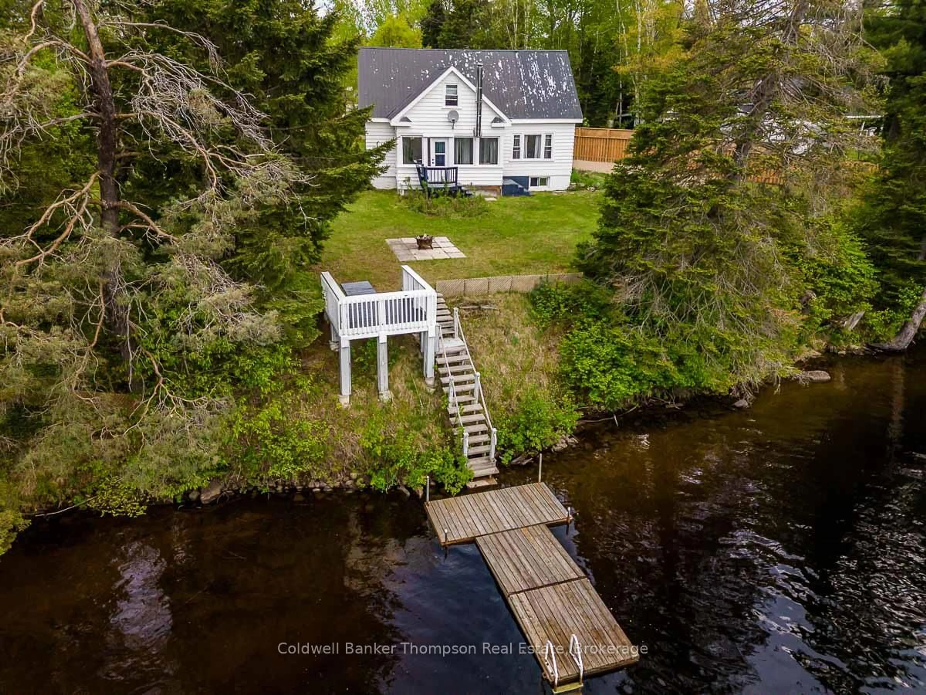 A pic from outside/outdoor area/front of a property/back of a property/a pic from drone, water/lake/river/ocean view for 1743 518 Highway #A, Kearney Ontario P0A 1M0