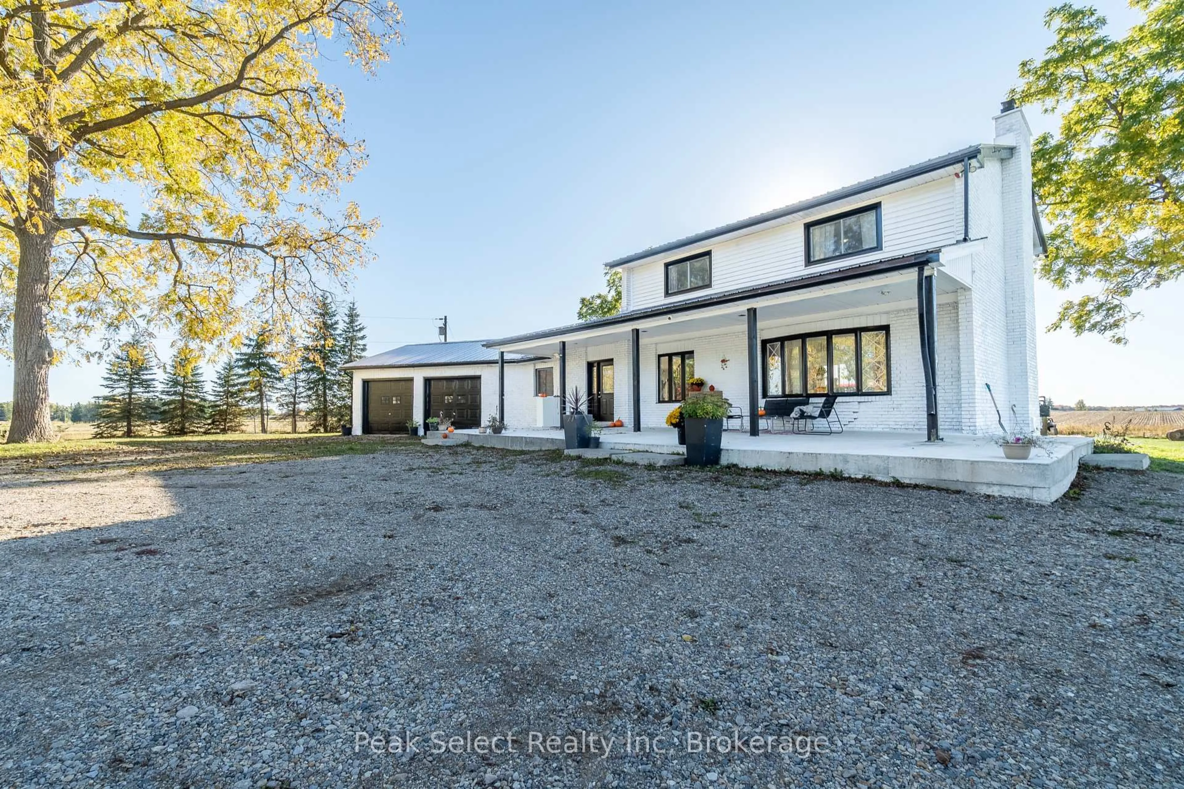A pic from outside/outdoor area/front of a property/back of a property/a pic from drone, street for 1982 Road 163, Perth South Ontario N4X 1C4