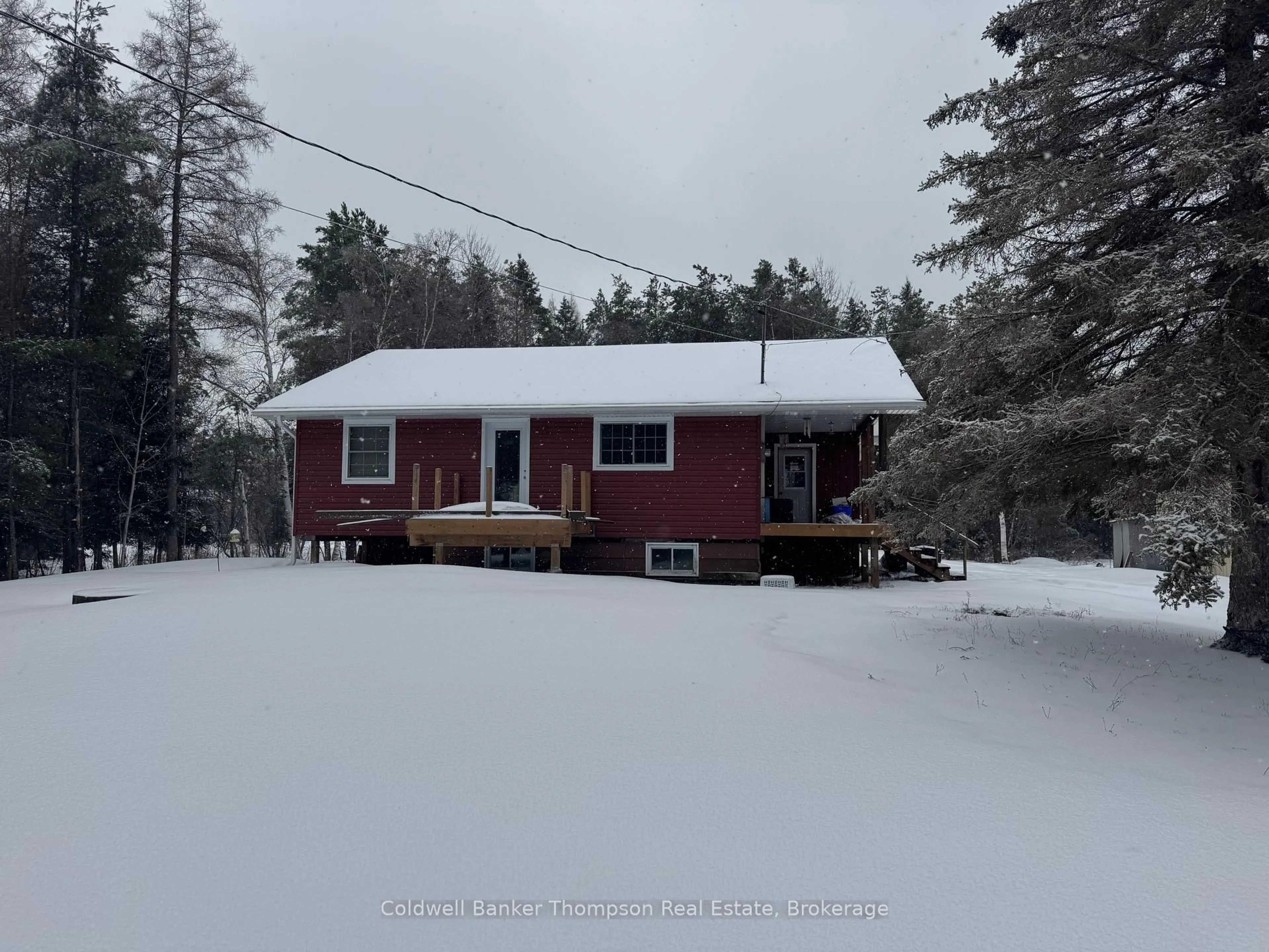 A pic from outside/outdoor area/front of a property/back of a property/a pic from drone, street for 605 Sweezy St, Powassan Ontario P0H 2L0
