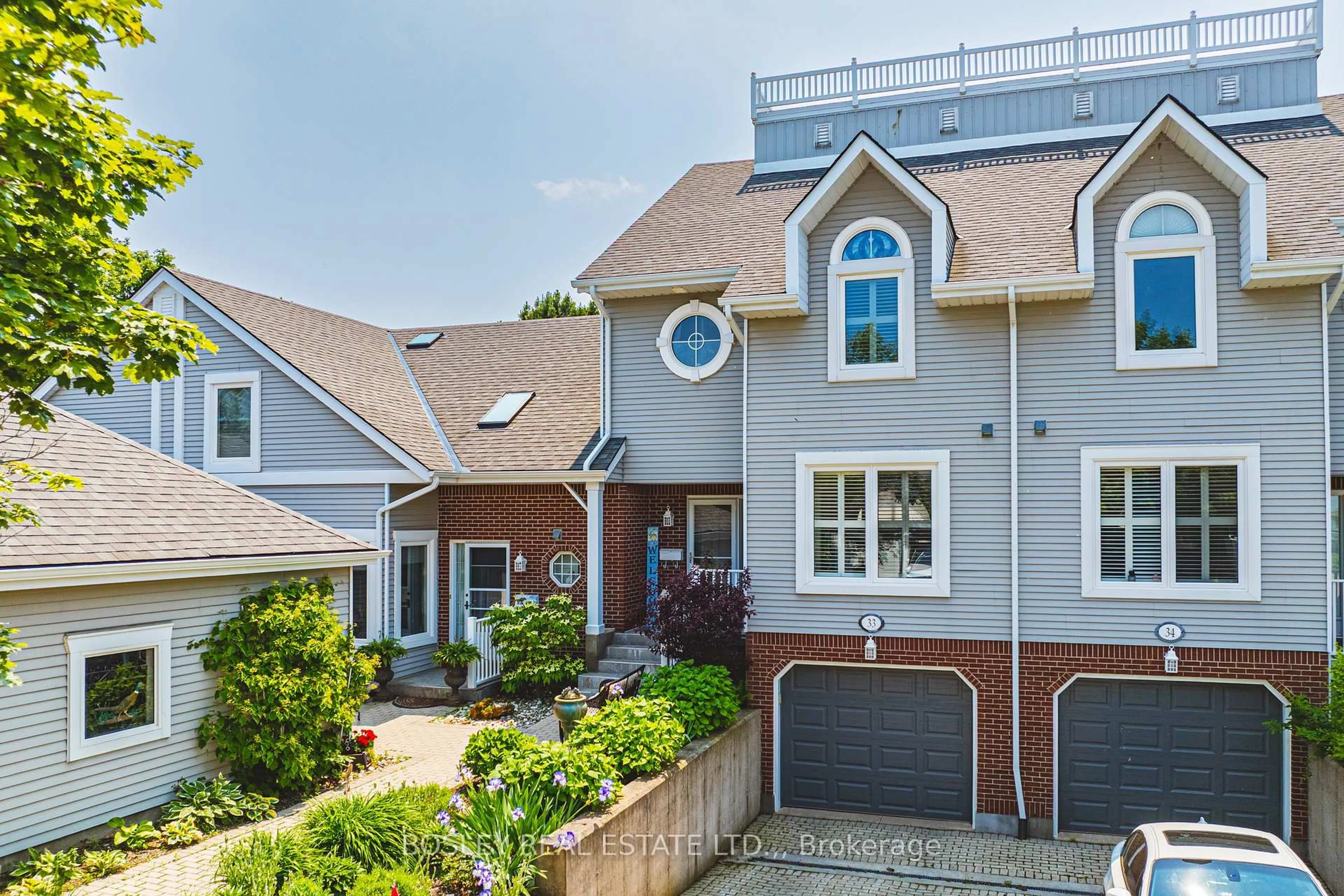 Home with brick exterior material, street for 13 Lakeside Dr #33, St. Catharines Ontario L2M 1P3