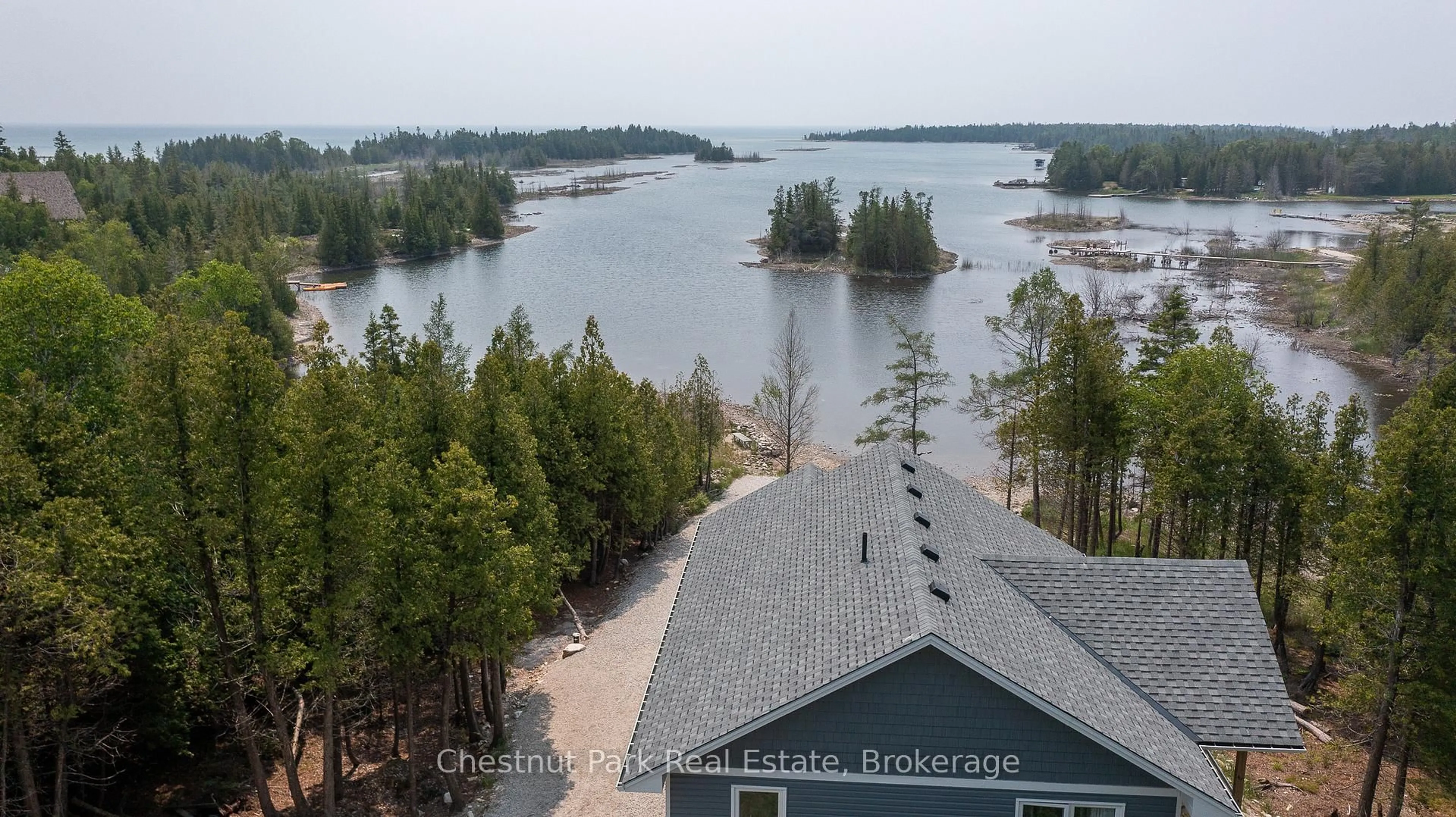 A pic from outside/outdoor area/front of a property/back of a property/a pic from drone, water/lake/river/ocean view for 277 Eagle Rd, Northern Bruce Peninsula Ontario N0H 2R0