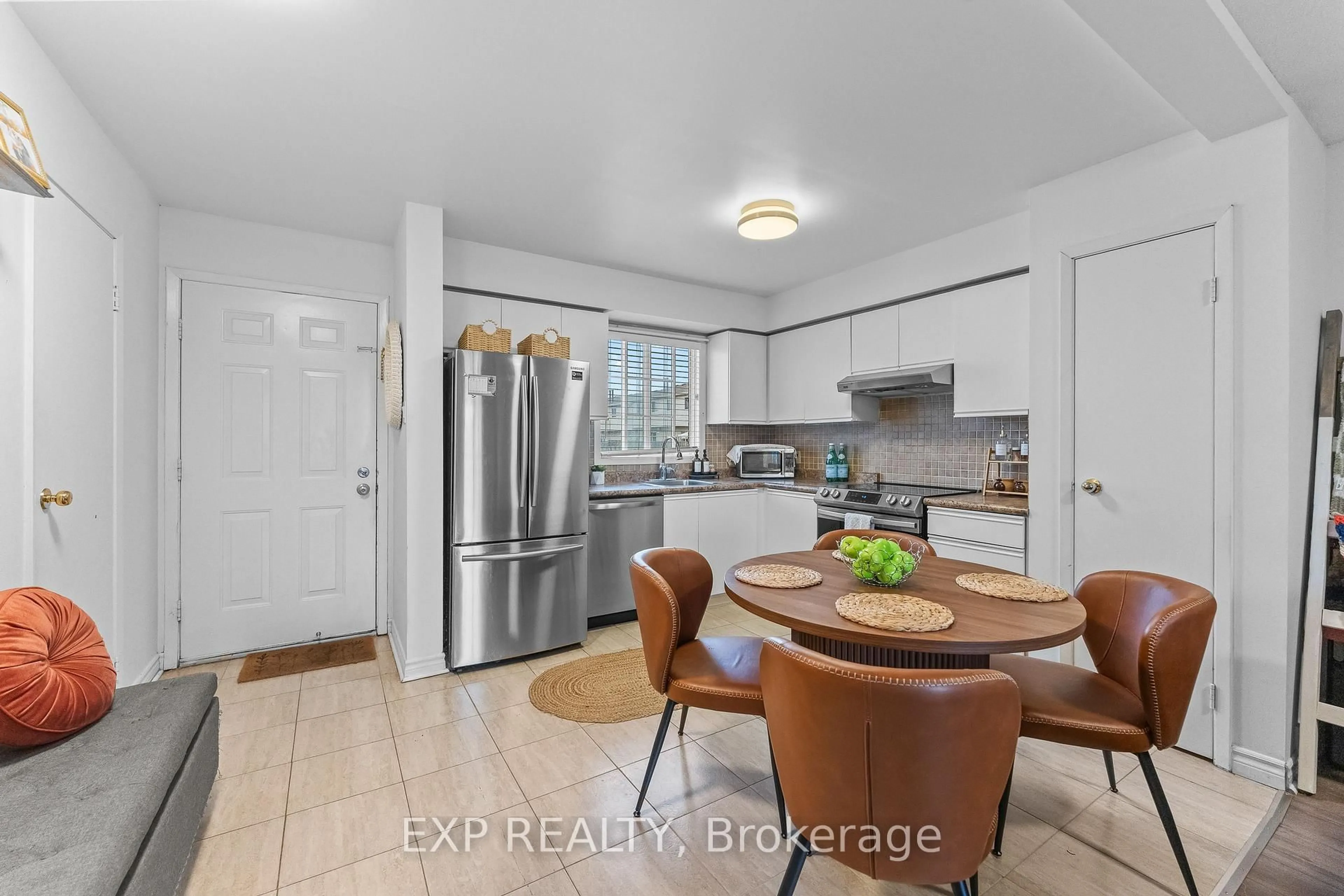 Open concept kitchen, ceramic/tile floor for 8141 Coventry Rd #84, Niagara Falls Ontario L2H 2X7