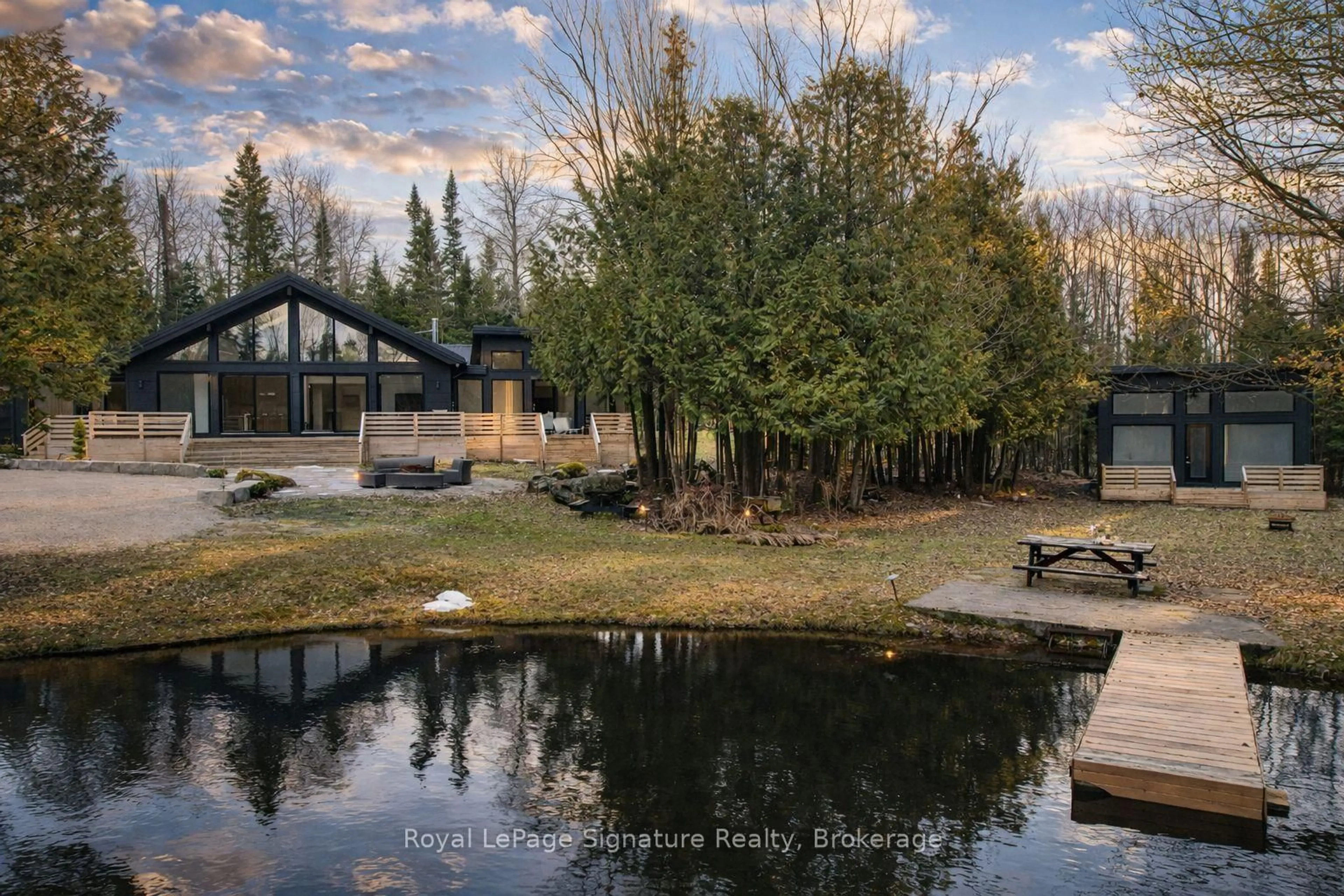 A pic from outside/outdoor area/front of a property/back of a property/a pic from drone, water/lake/river/ocean view for 415040 10TH Line, Blue Mountains Ontario N0H 2E0