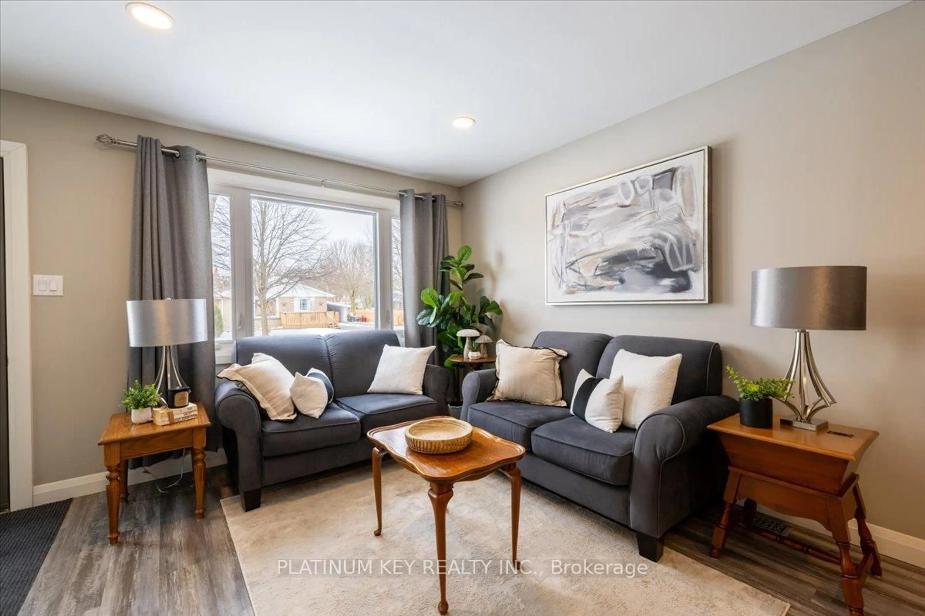 Living room with furniture, wood/laminate floor for 42 Garland Cres, London East Ontario N5V 1N5