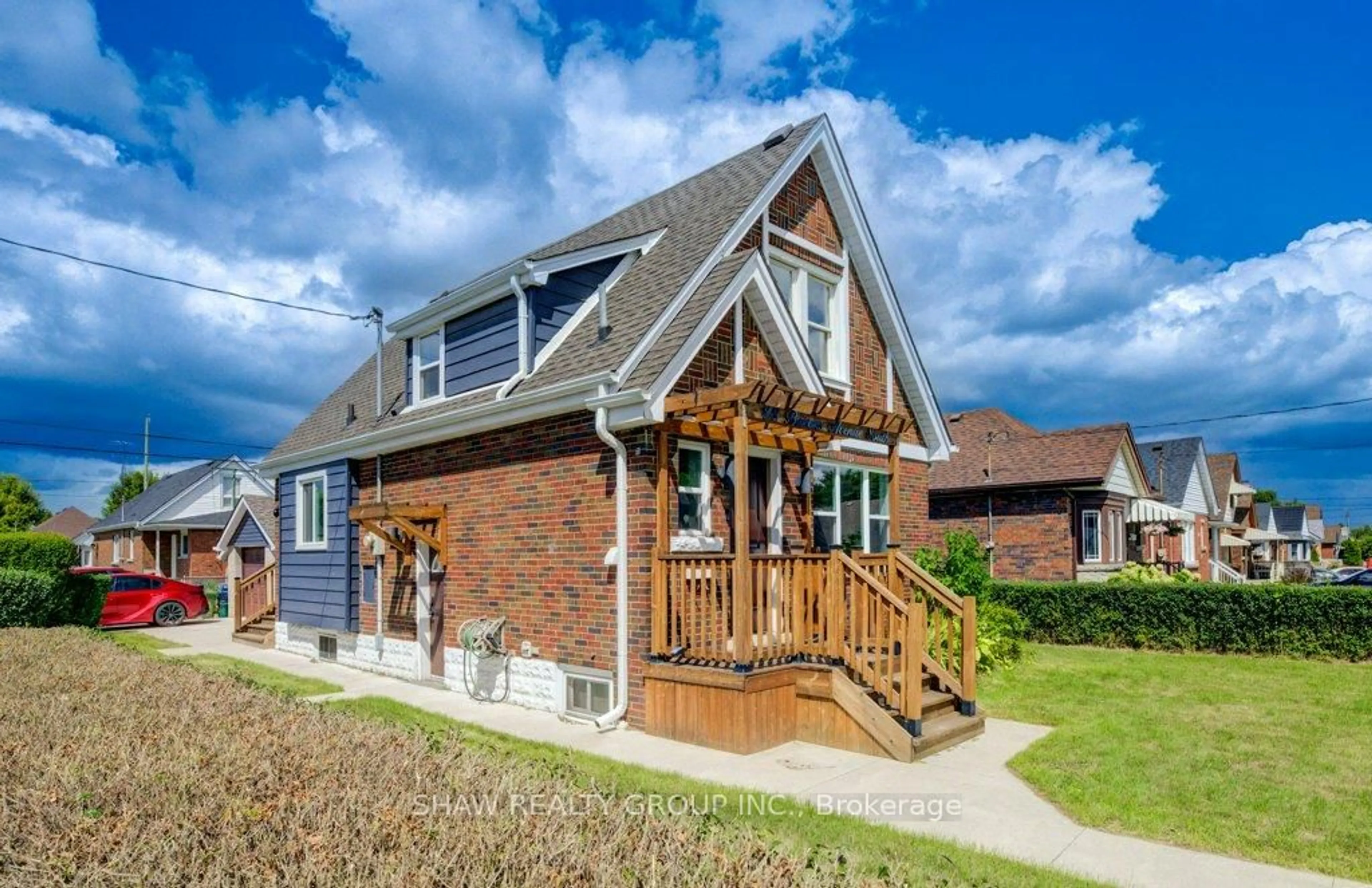 Home with brick exterior material, street for 28 Barons Ave, Hamilton Ontario L8K 2X9