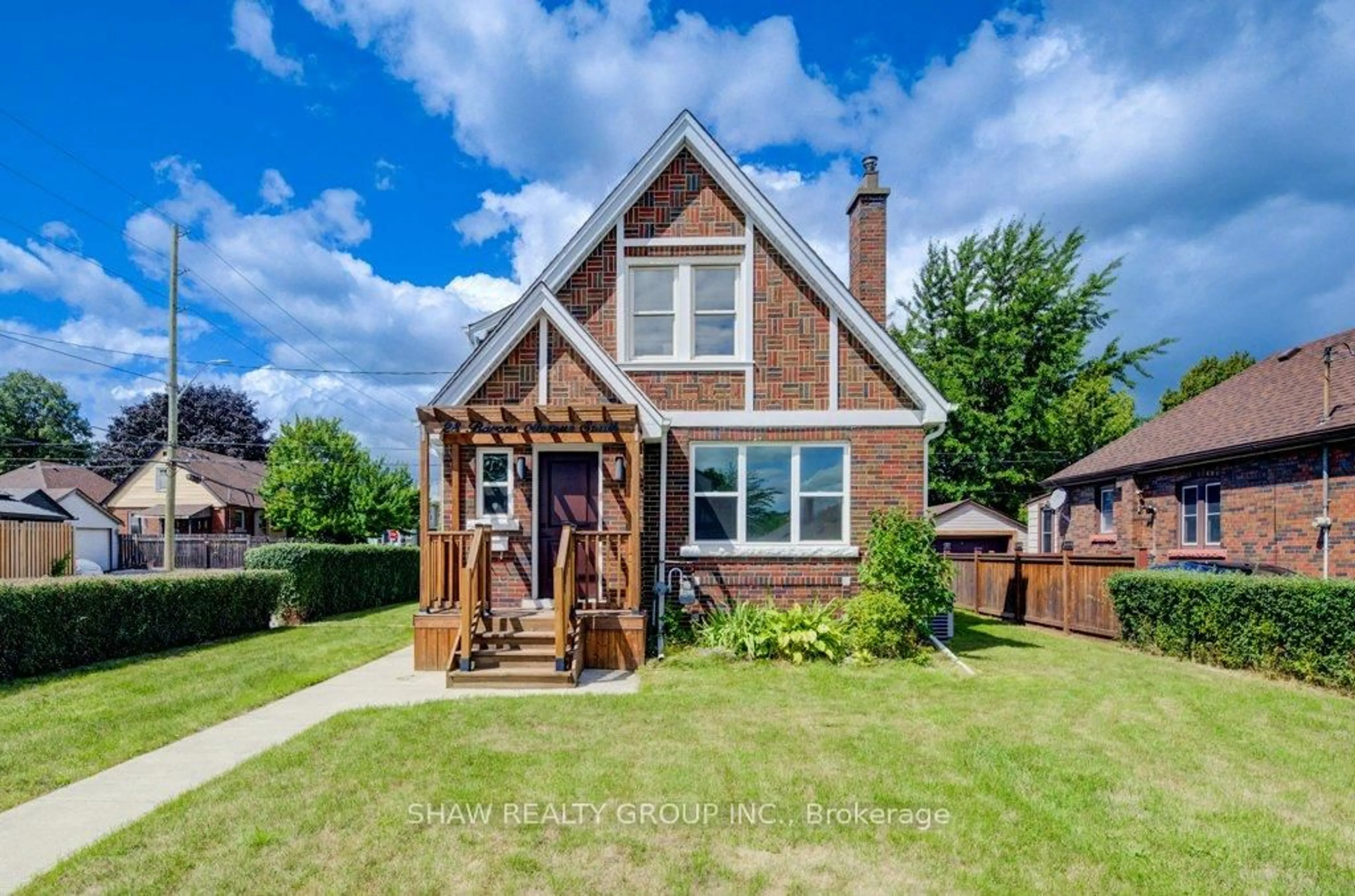 Home with brick exterior material, street for 28 Barons Ave, Hamilton Ontario L8K 2X9