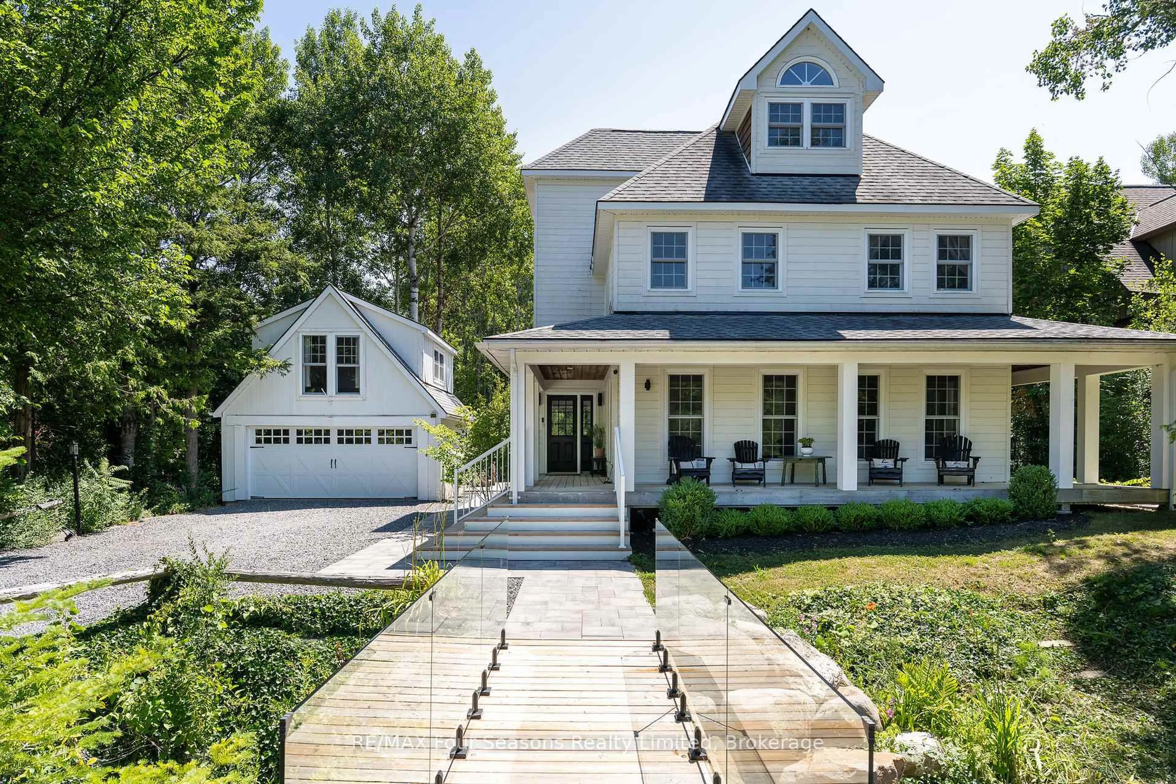 Home with brick exterior material, street for 141 Aspen Way, Blue Mountains Ontario L9Y 0S7