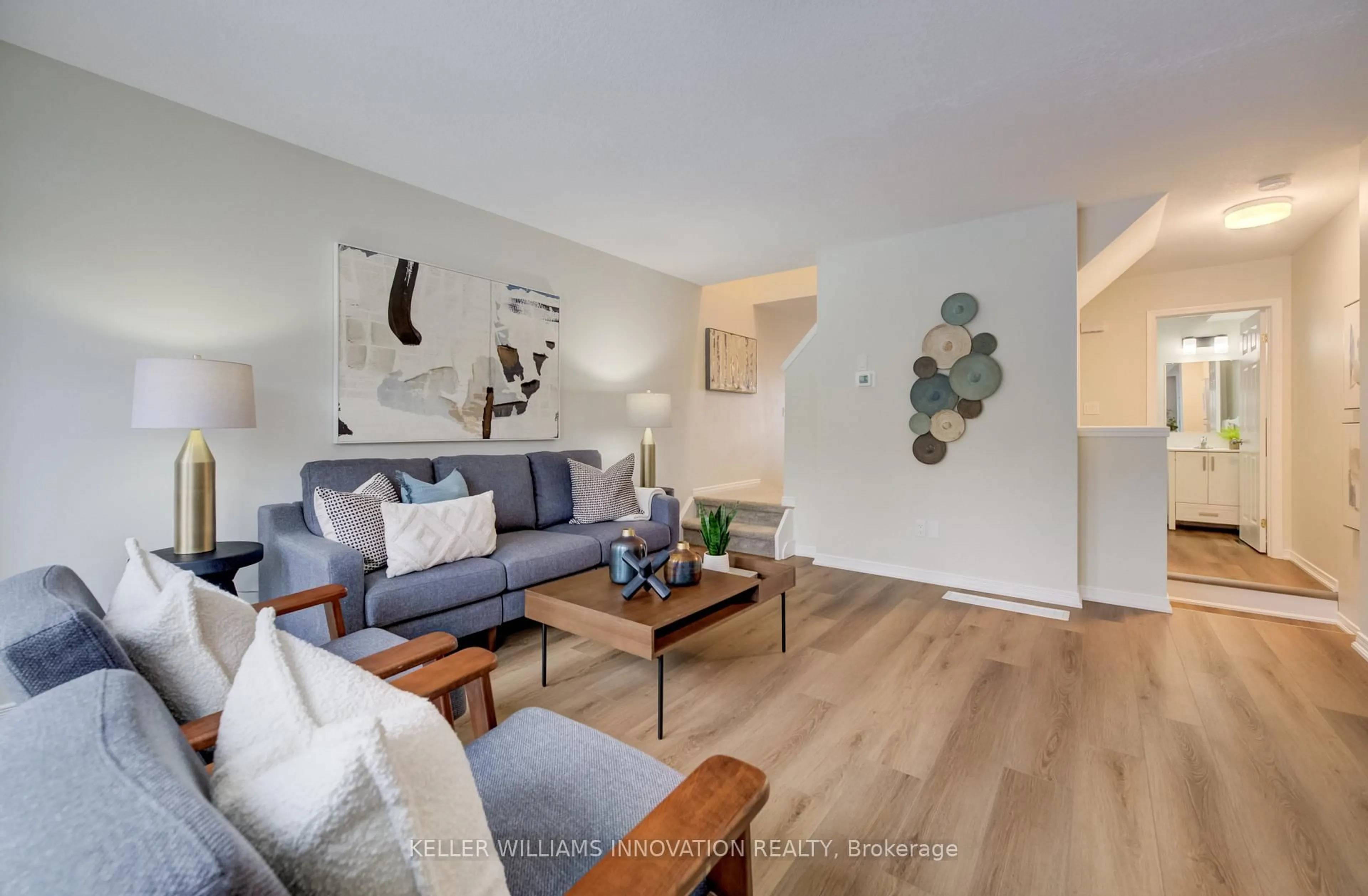 Living room with furniture, wood/laminate floor for 151 Highland Cres, Kitchener Ontario N2M 0A1