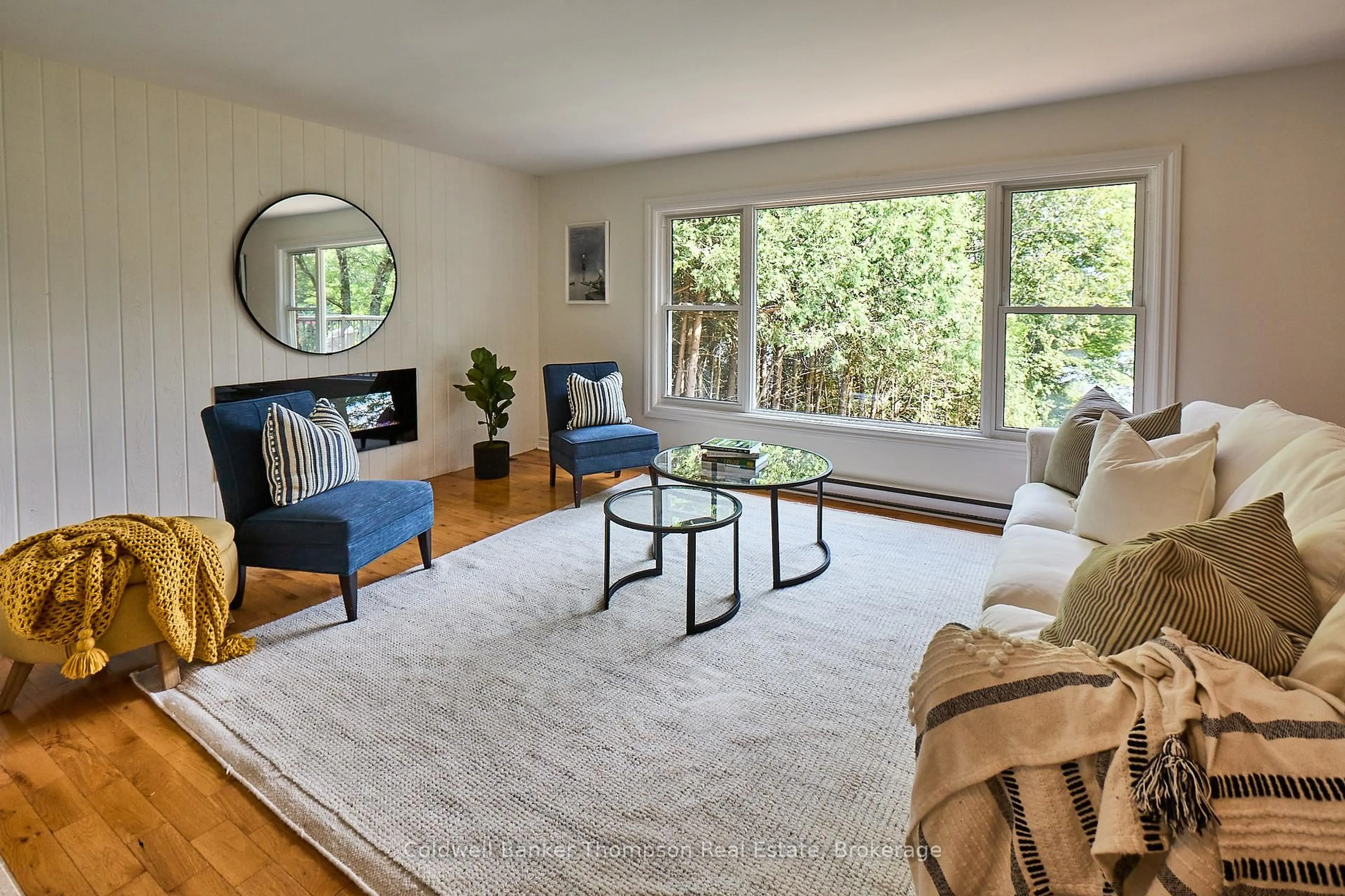 Living room with furniture, unknown for 109 Riverside Dr, Huntsville Ontario P1H 1R6