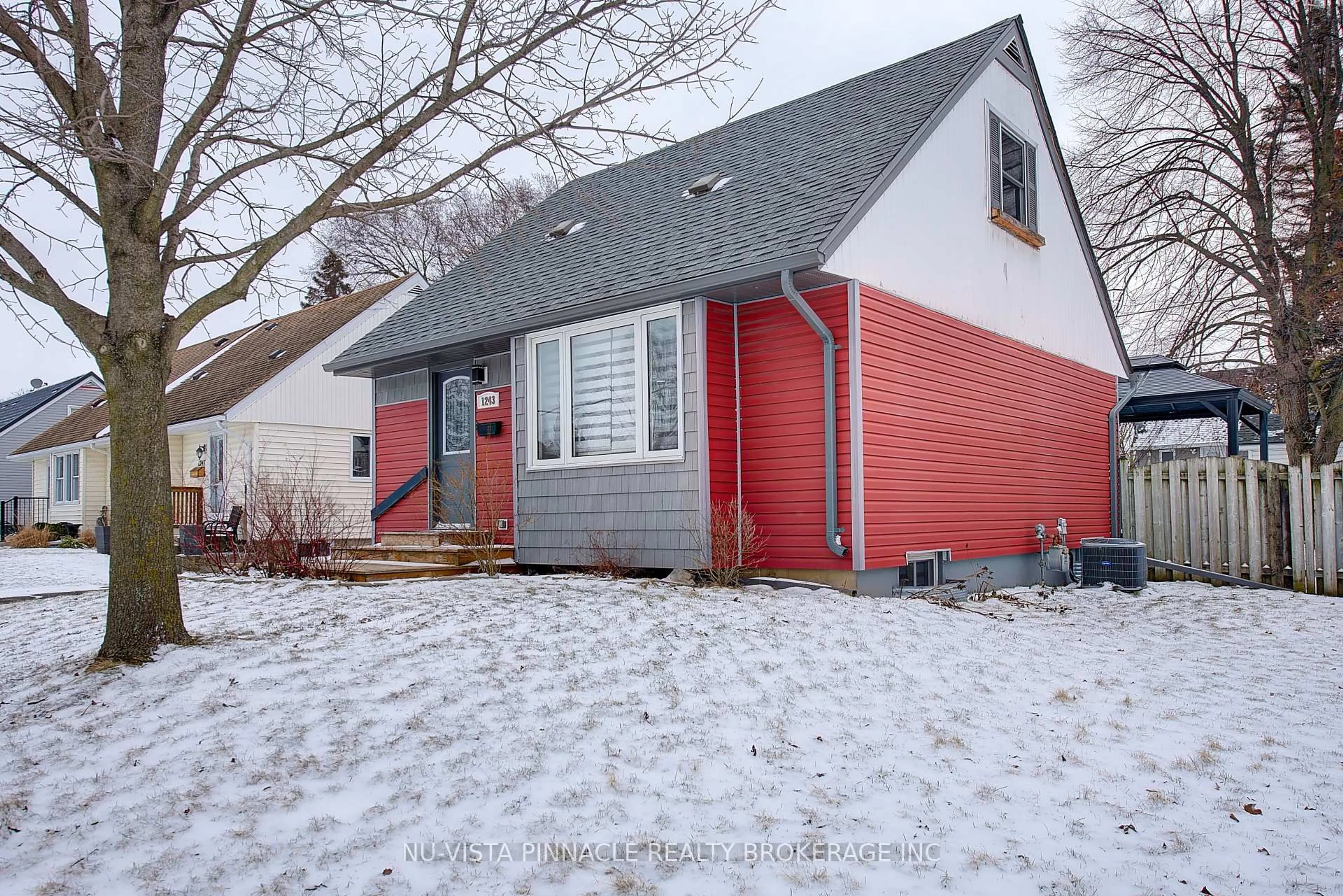 Home with vinyl exterior material, street for 1243 Landor St, London East Ontario N5Y 3W2