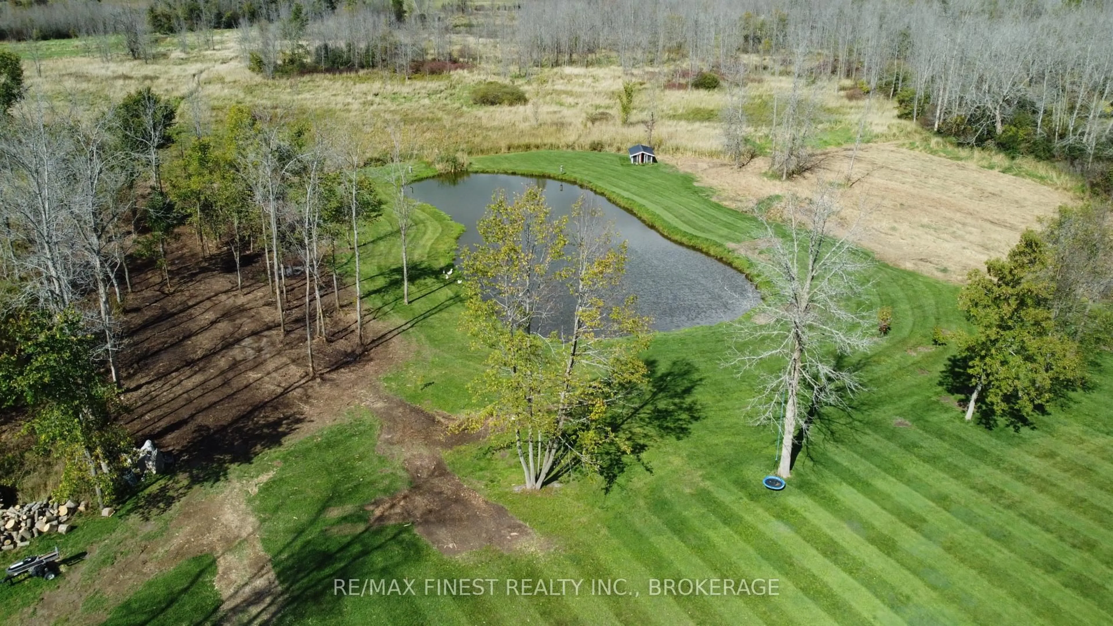 A pic from outside/outdoor area/front of a property/back of a property/a pic from drone, water/lake/river/ocean view for 923 Maple Rd, Bissett Creek Ontario K0H 2H0
