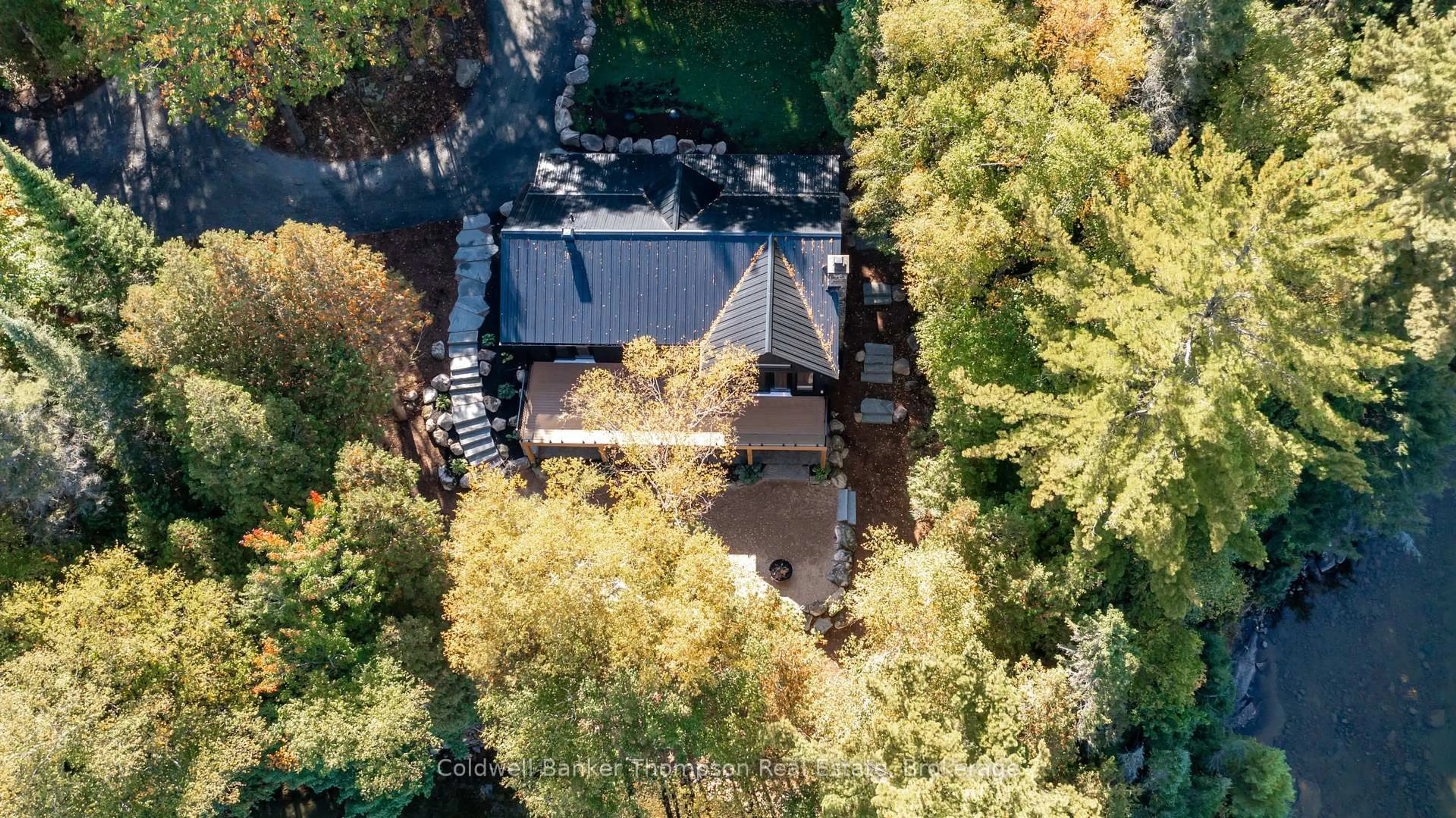 A pic from outside/outdoor area/front of a property/back of a property/a pic from drone, unknown for 1108 South Bernard Lake Rd, Sundridge Ontario P0A 1Z0