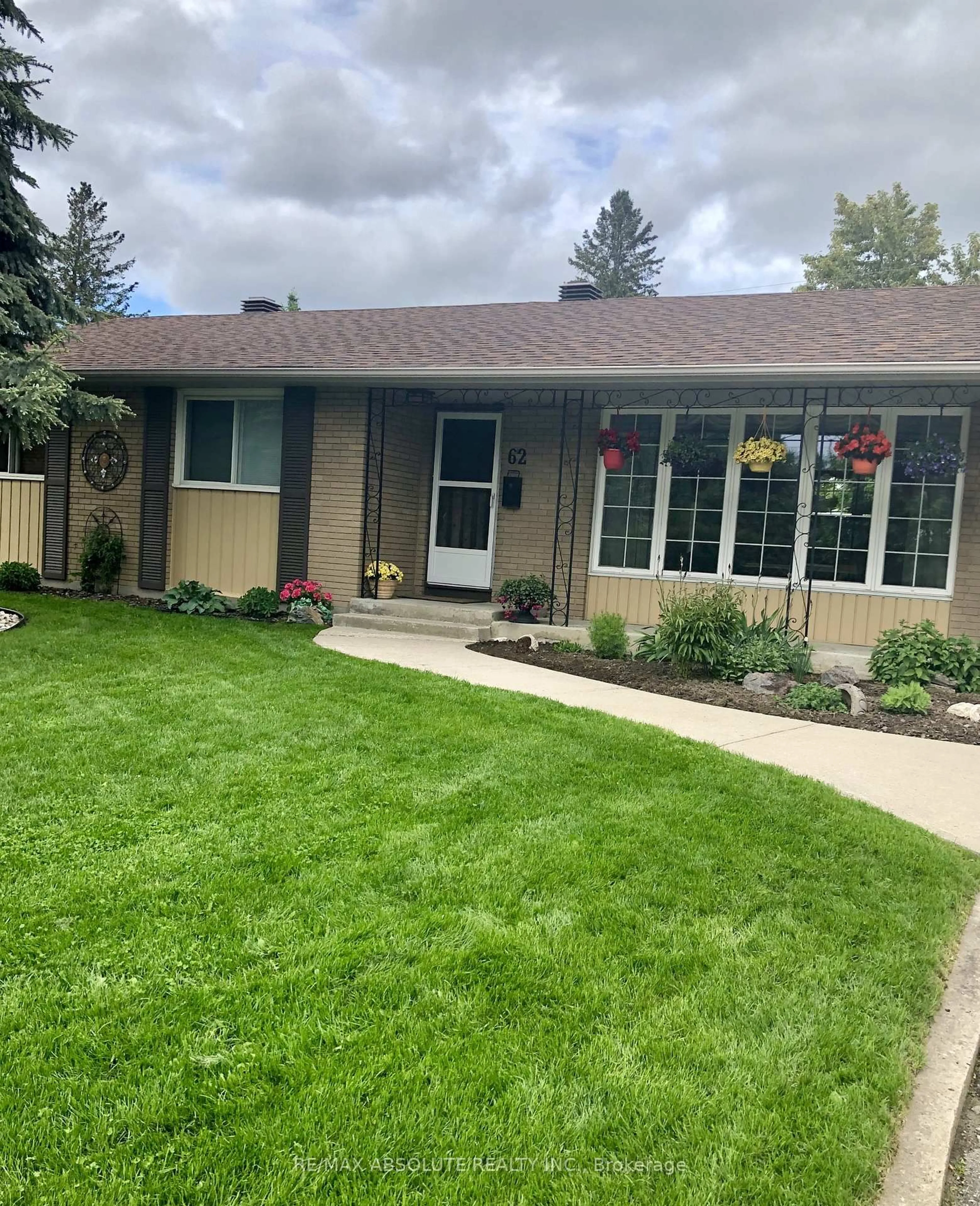 Home with vinyl exterior material, street for 62 Foothills Dr, Ottawa Ontario K2H 6K3