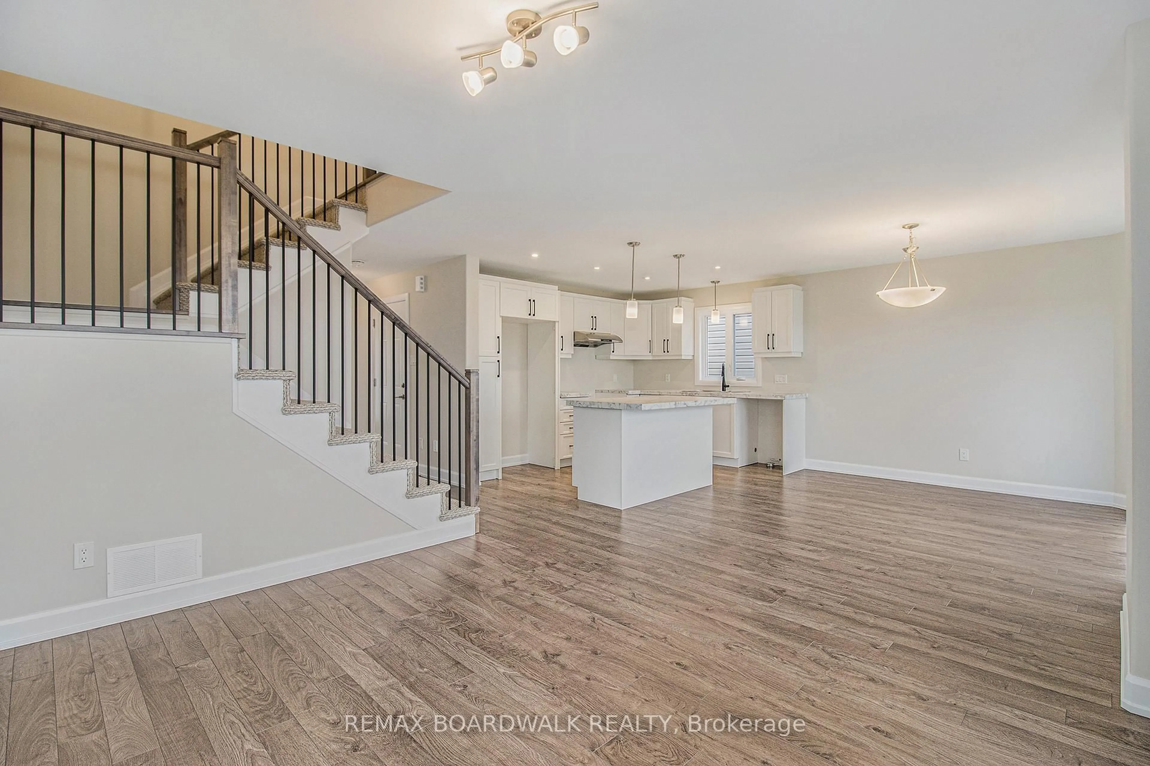 Open concept kitchen, wood/laminate floor for 1207 MONTBLANC Cres, Russell Ontario K0A 1W0